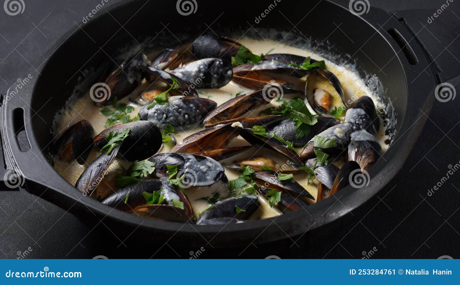 Blue Mussels Stewed in Cream Wine Sauce with Garlic and Herbs. Italian