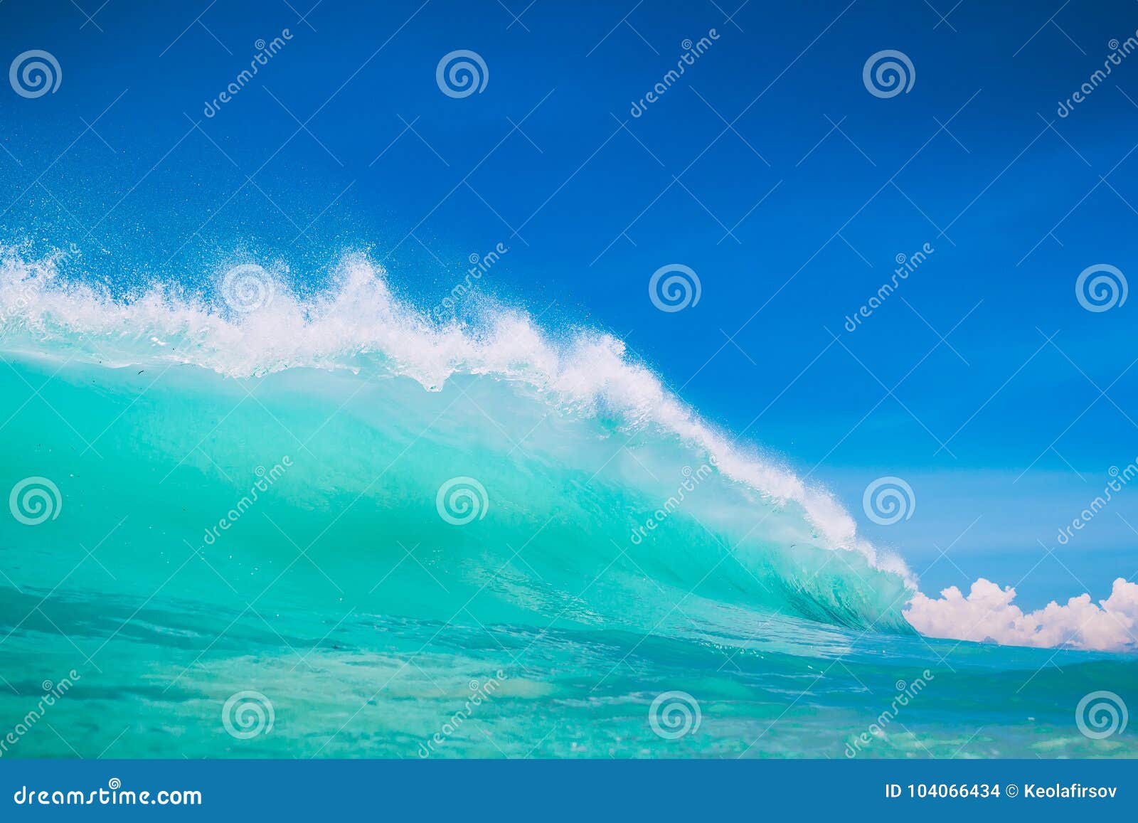 blue ocean wave at tropical beach. clear wave in tropics and blue sky