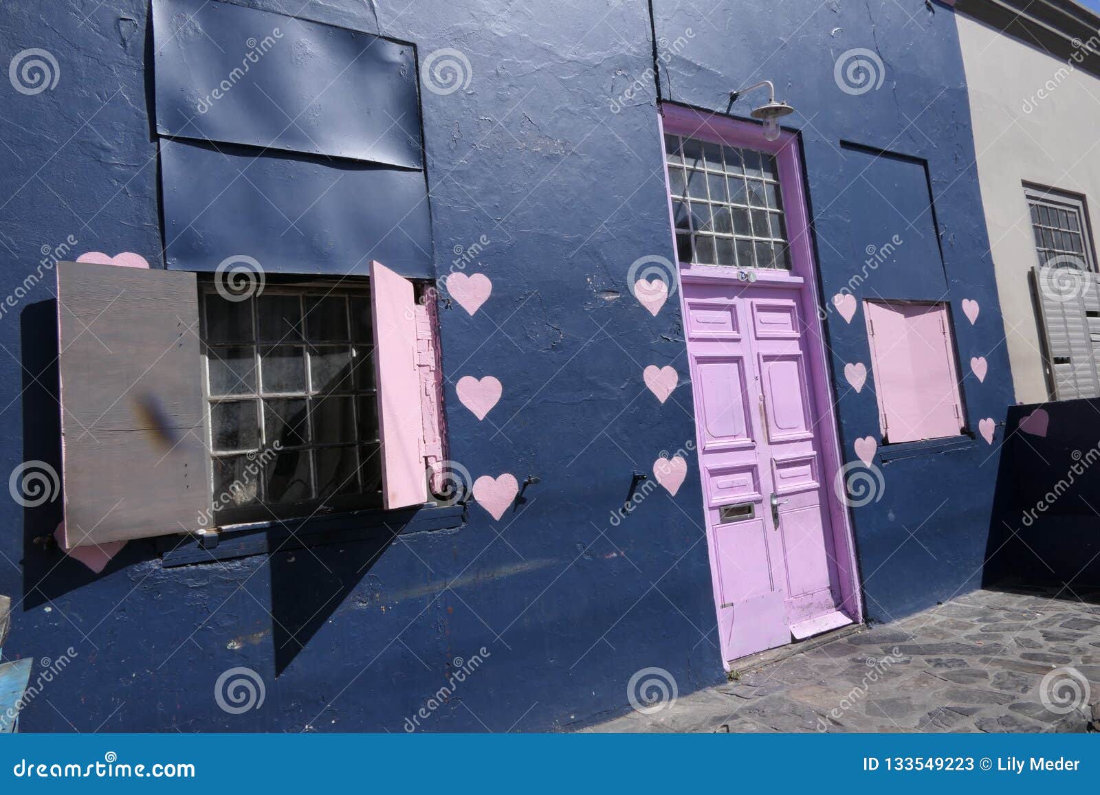 Blue and pink house editorial stock photo. Image of pink 133549223