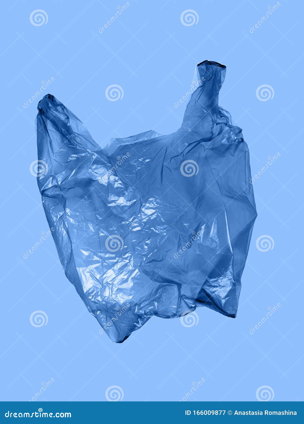 Blue Plastic Bag on Light Blue Background. Flying Package Stock Image Image of packaging