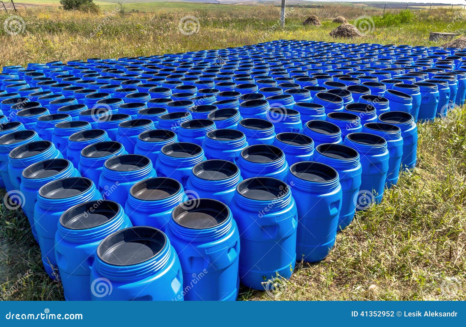 The Blue Plastic Barrels for Storage of Chemicals Stock Photo Image