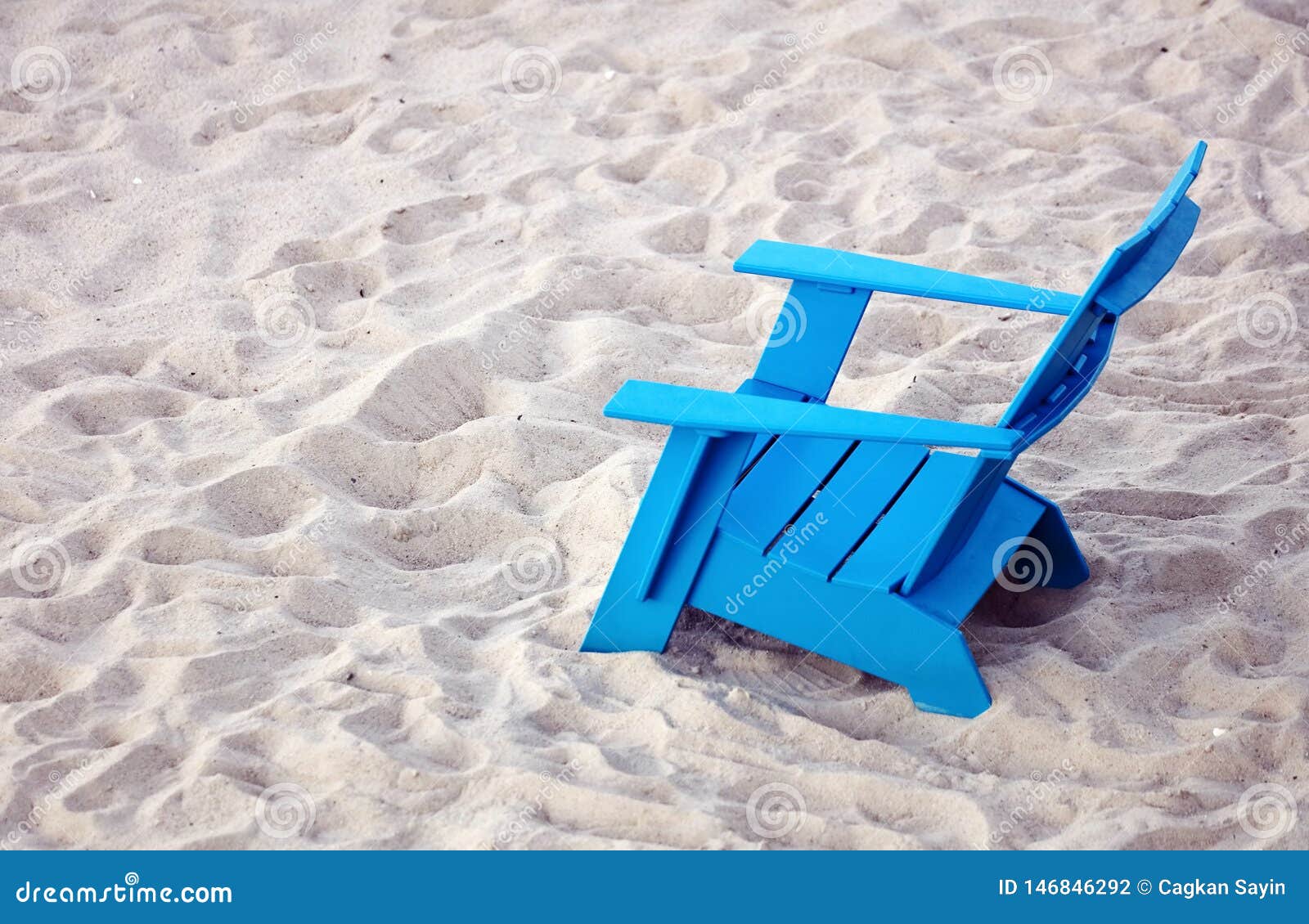 Blue Plastic Deck Chair on the Sands of a Beach Stock Photo Image of