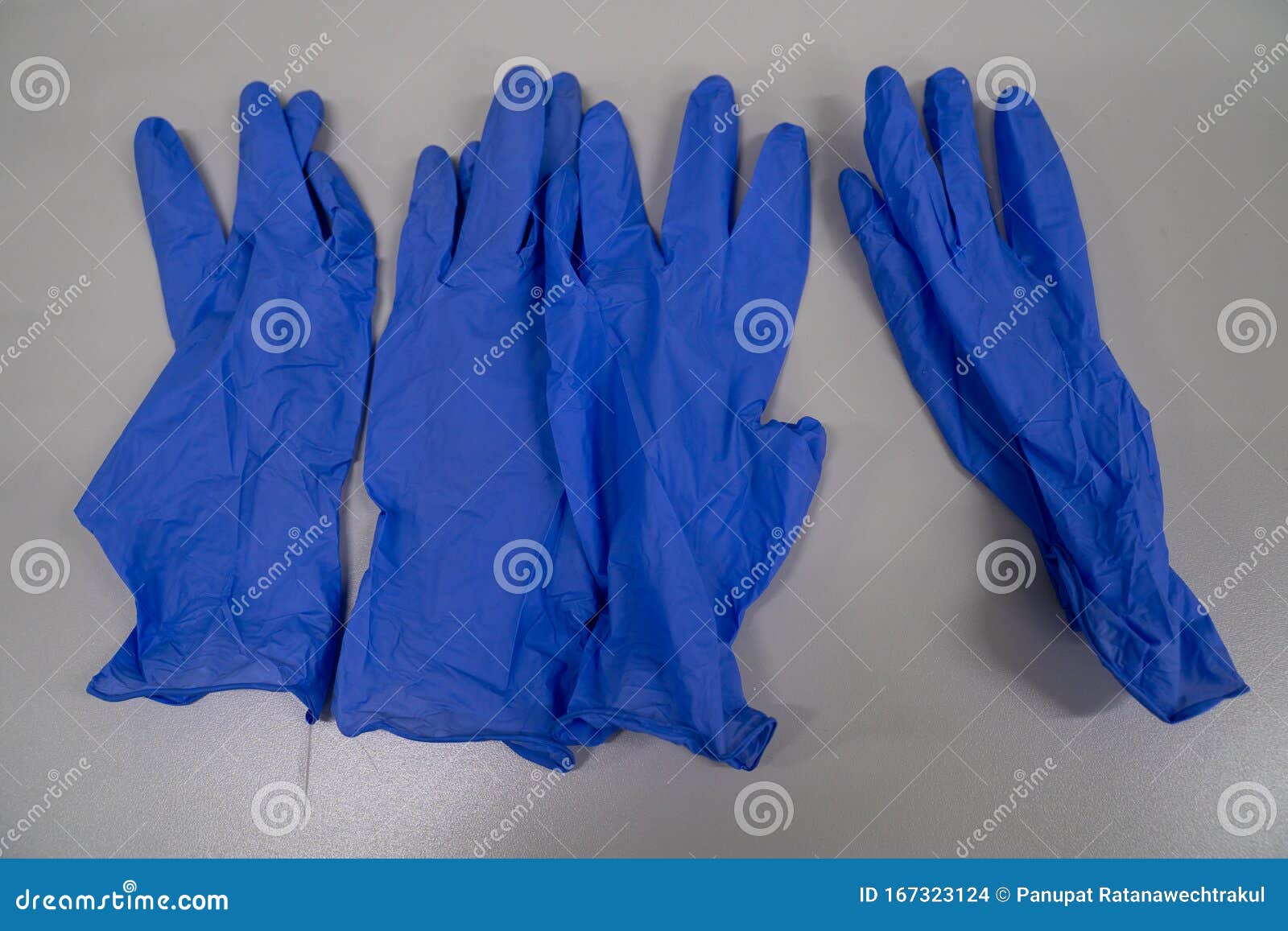 The Blue Plastic Gloves Used in Medical and Science Stock Photo Image