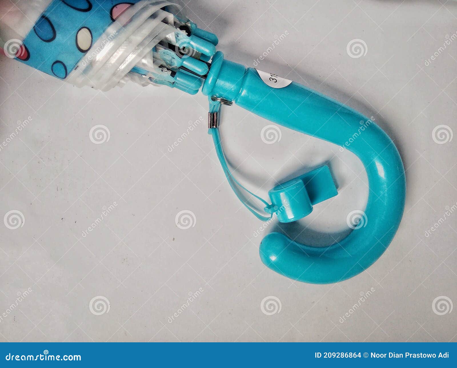 Blue Plastic Umbrella Handle Stock Photo Image of turquoise, azure
