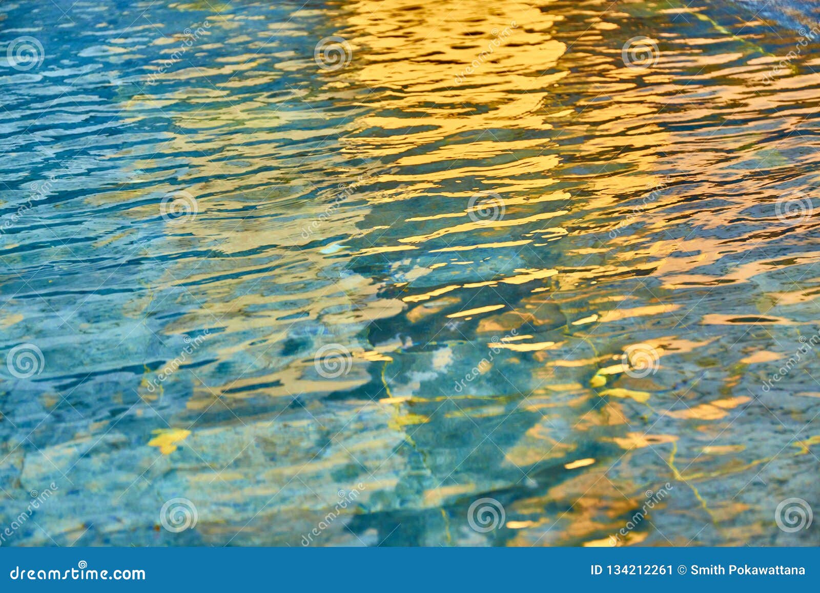 pool transparent water with sun reflections