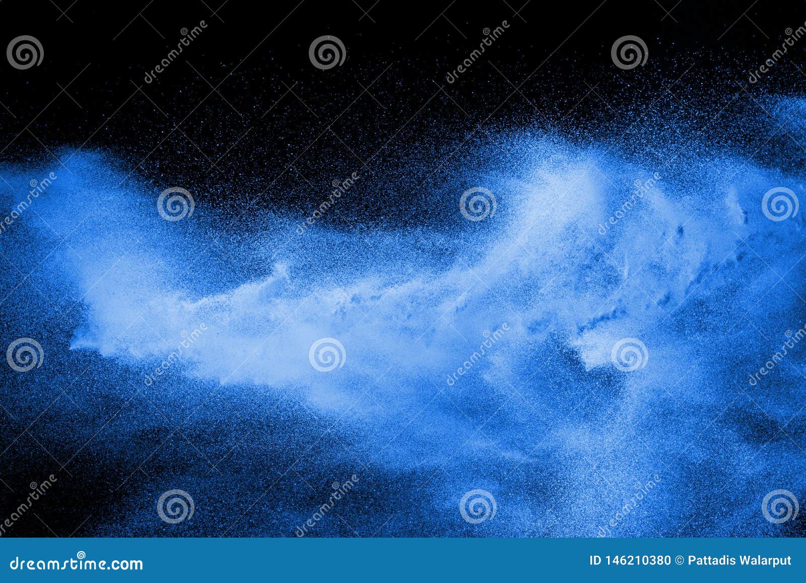 blue powder explode cloud on black background. launched blue dust particles splash