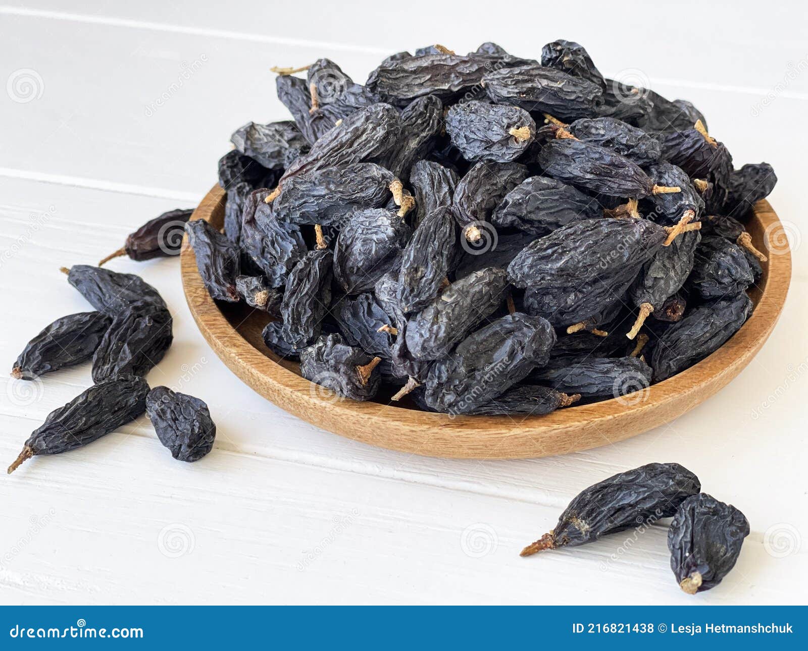 Blue raisins on a plate stock photo. Image of vegetarian - 216821438