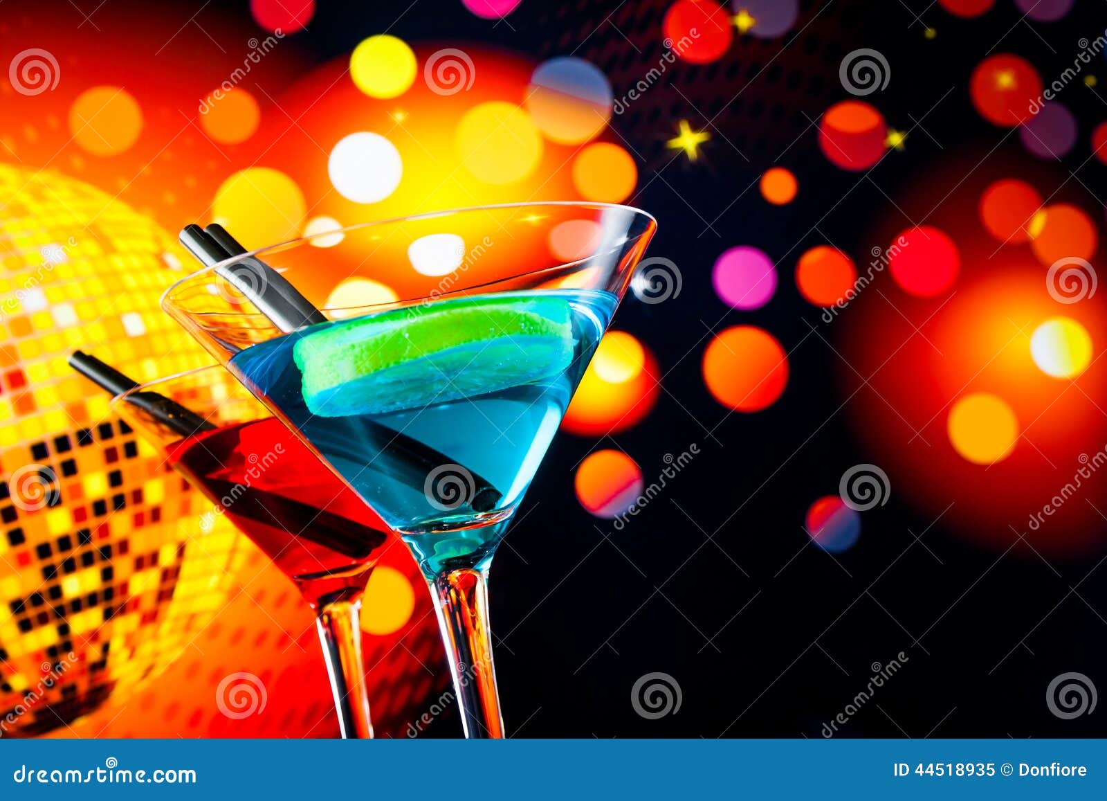 Blue and Red Cocktail with Sparkling Disco Ball Background with Space