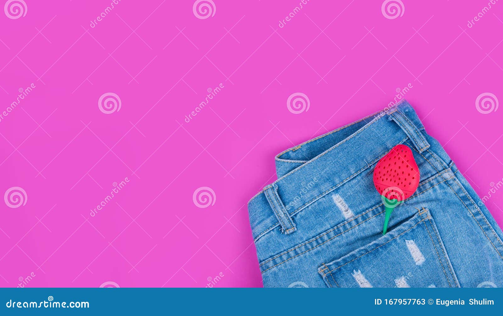 Blue Ripped Denim Shorts on a Pink Background Stock Image - Image of ...