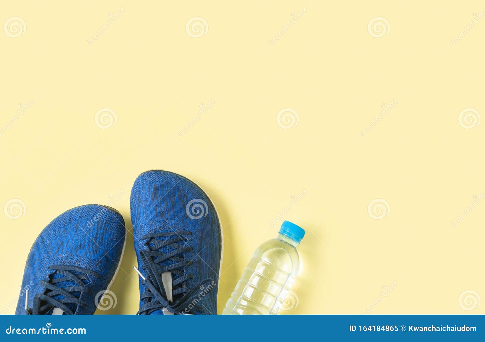 Download Blue Running Shoes And Bottle Of Water On Yellow Background Stock Image Image Of Pair Healthy 164184865 Yellowimages Mockups