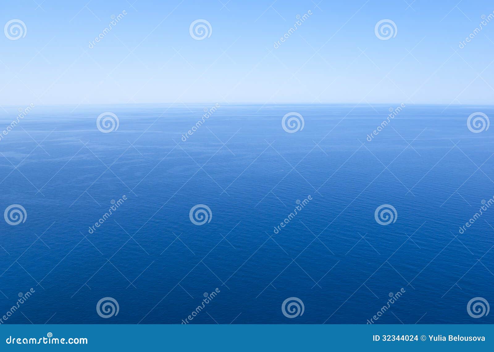 blue sea and cloudless sky