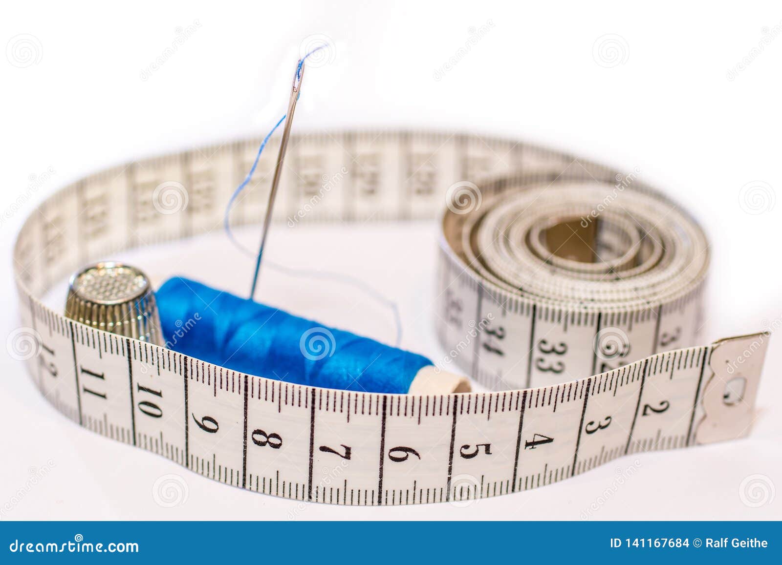 Needle, Thread, Measuring Tape and Thimble As a Symbol for Tailoring