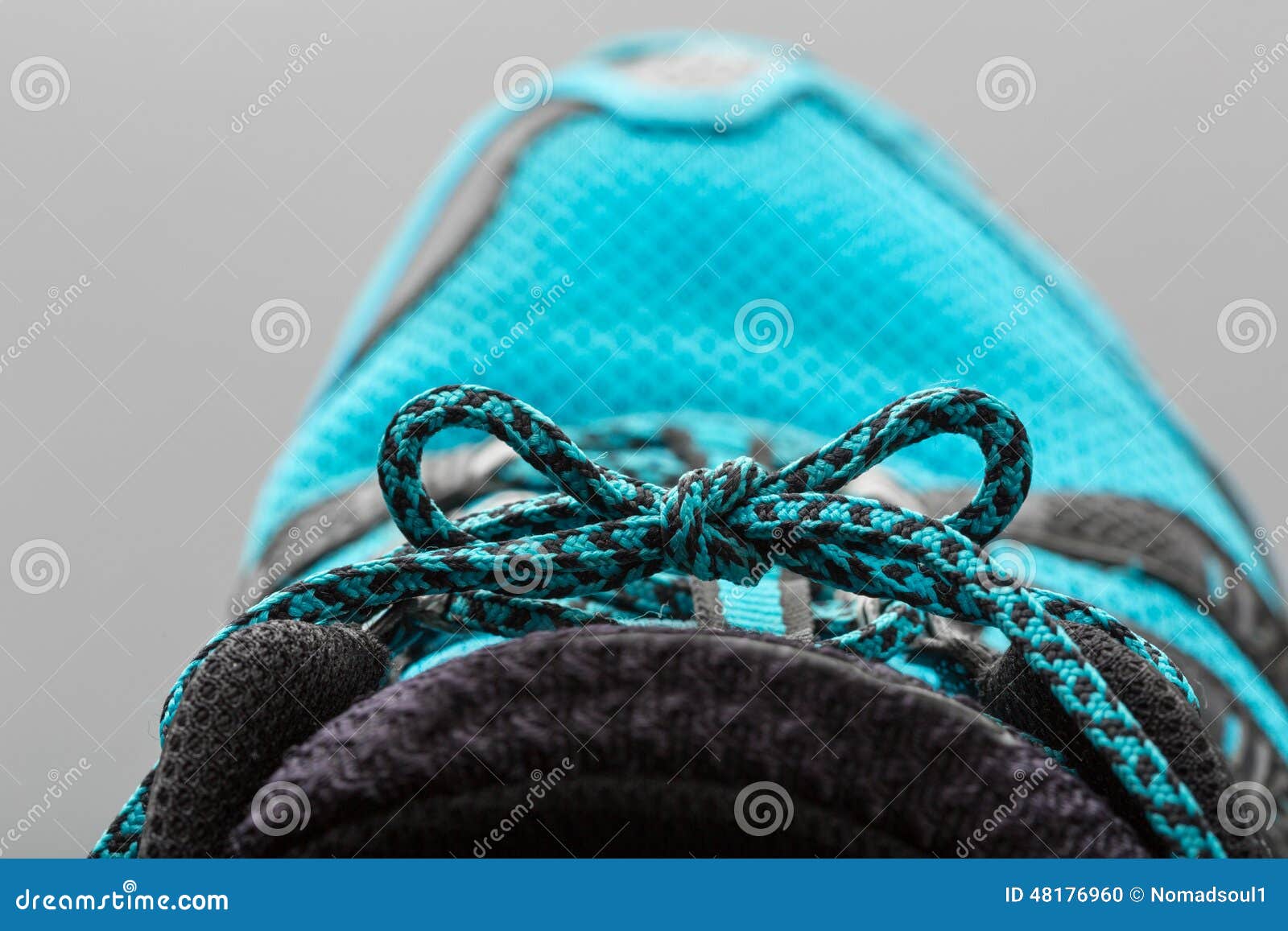 Blue shoelaces on grey stock photo. Image of sport, modern 48176960