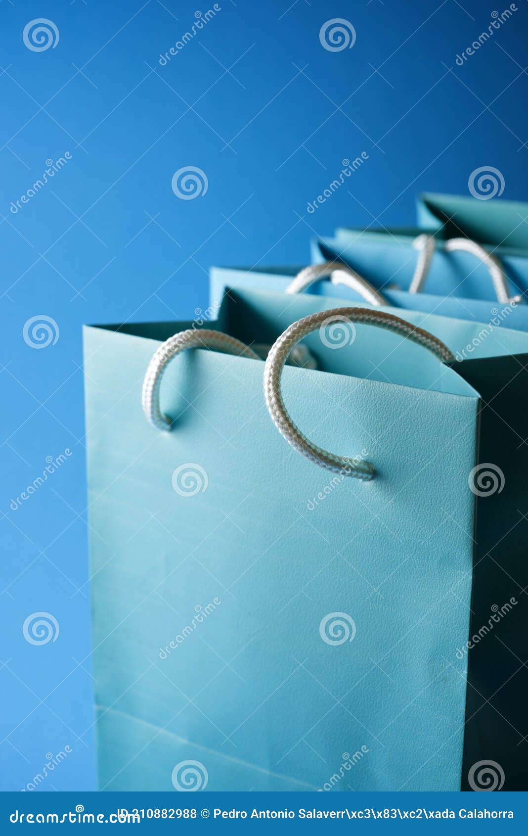 Blue shopping bags stock photo. Image of small, decoration - 210882988