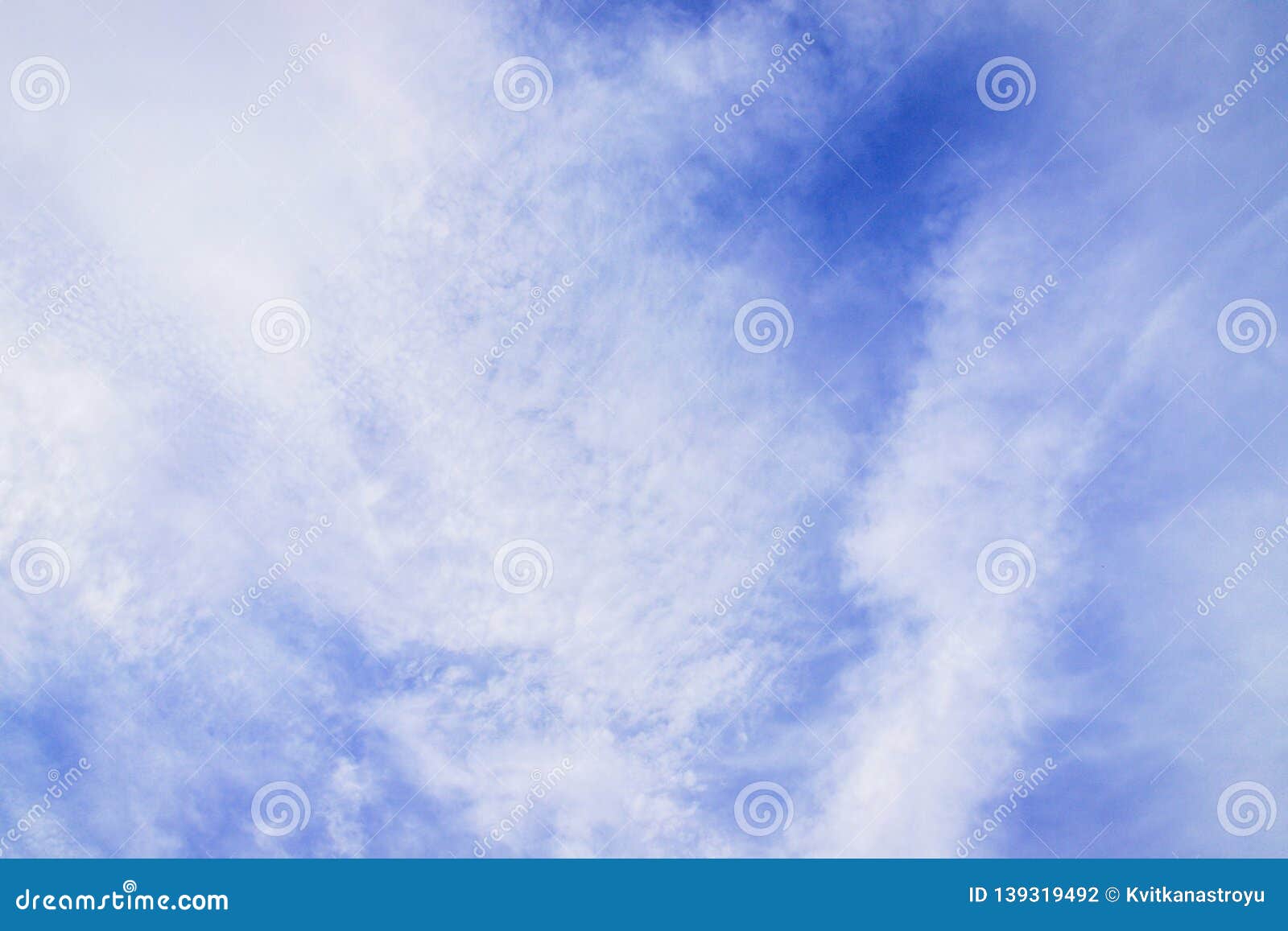 blue sky with cirro cumulus white clouds. sky background