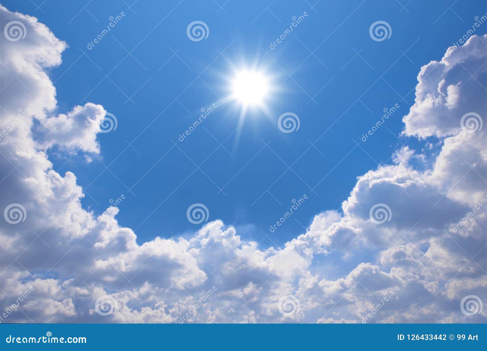 blue sky with clouds and sun reflection.the sun shines bright in