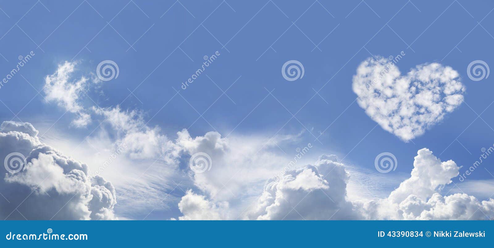 blue sky and love heart d fluffy clouds
