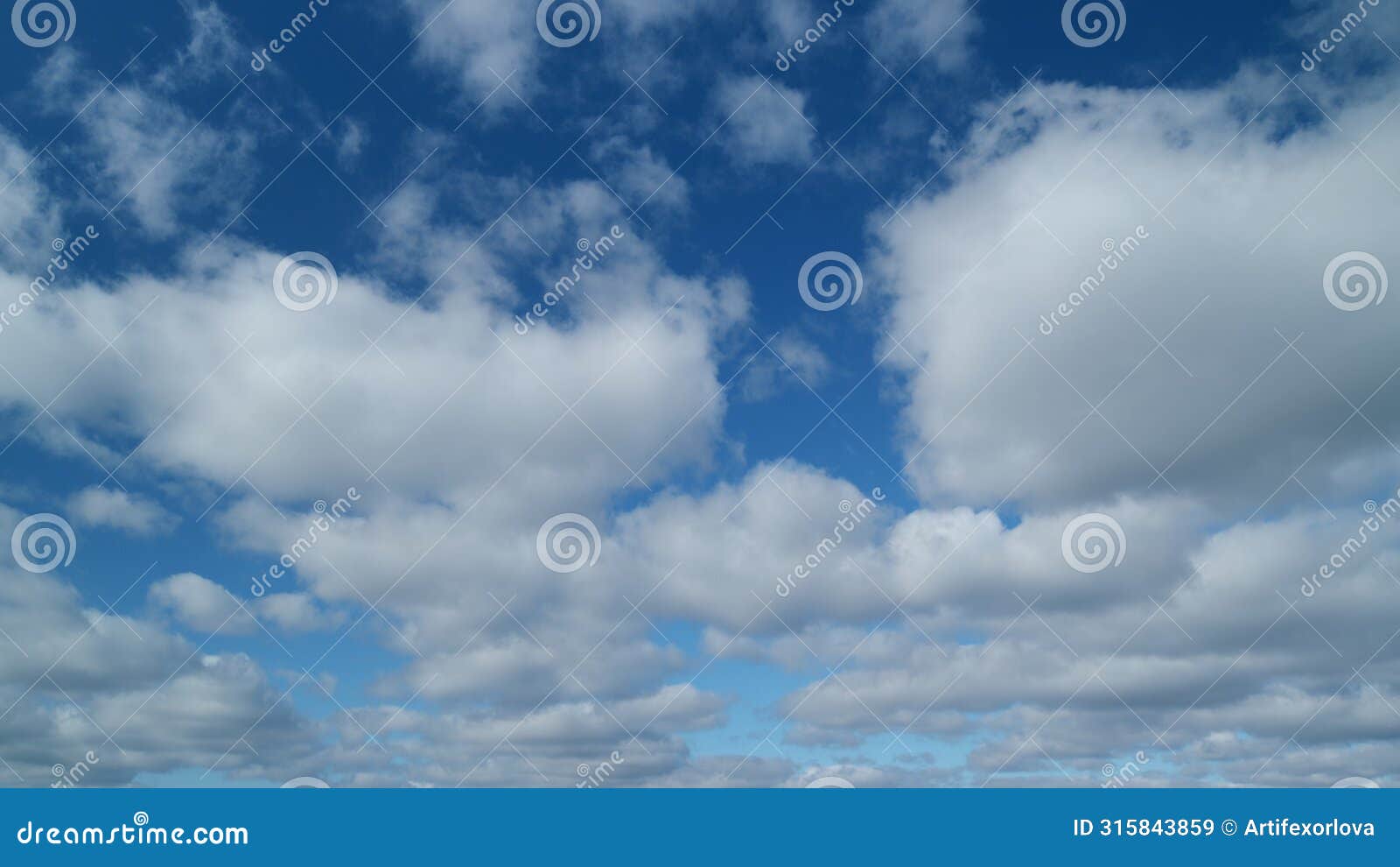 blue sky with stratocumulus clouds and sun. beautiful sky with clouds background. timelapse.