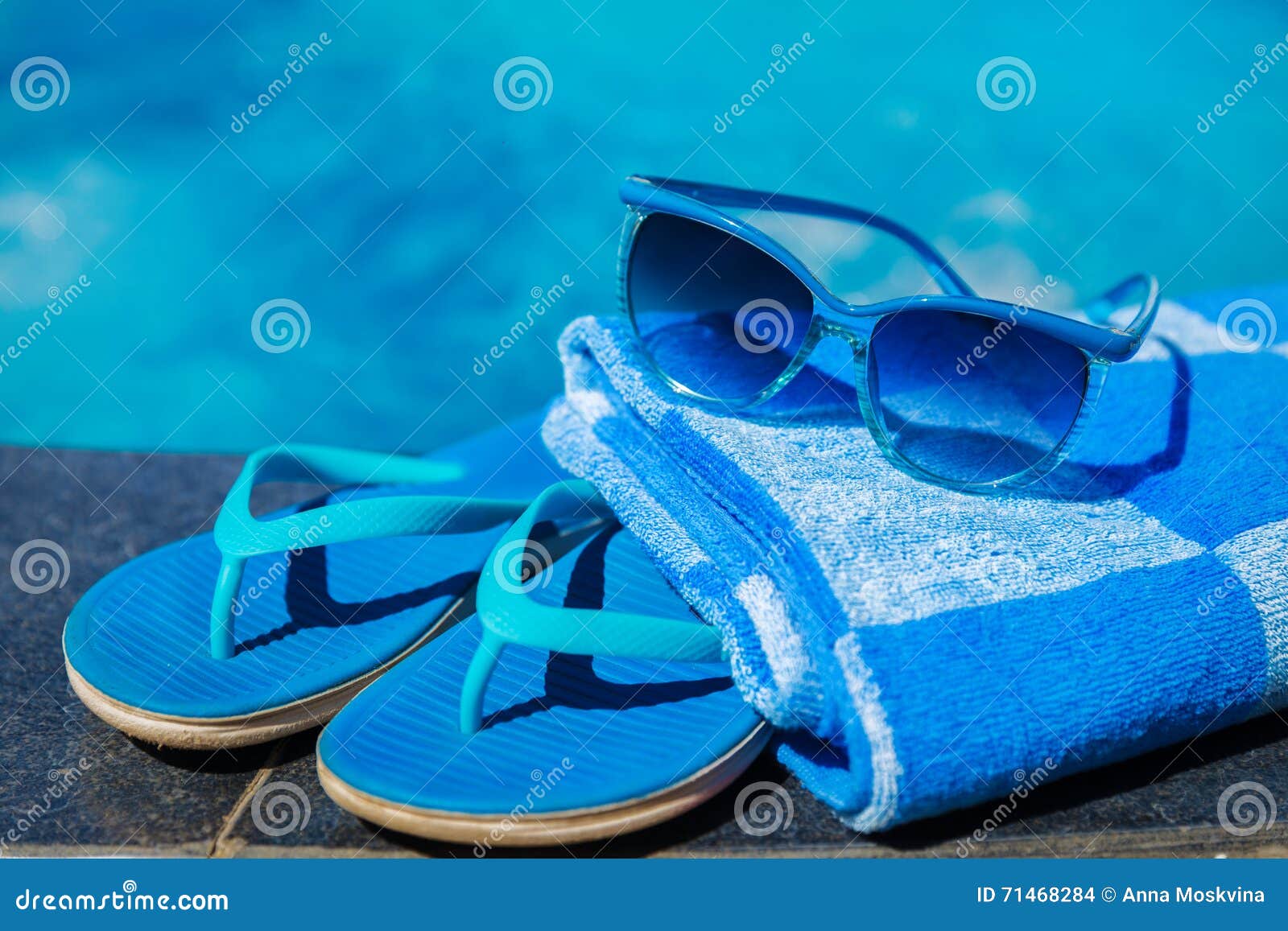 Blue Slippers and Sun Glasses Near Swimming Pool - Holiday Concept ...