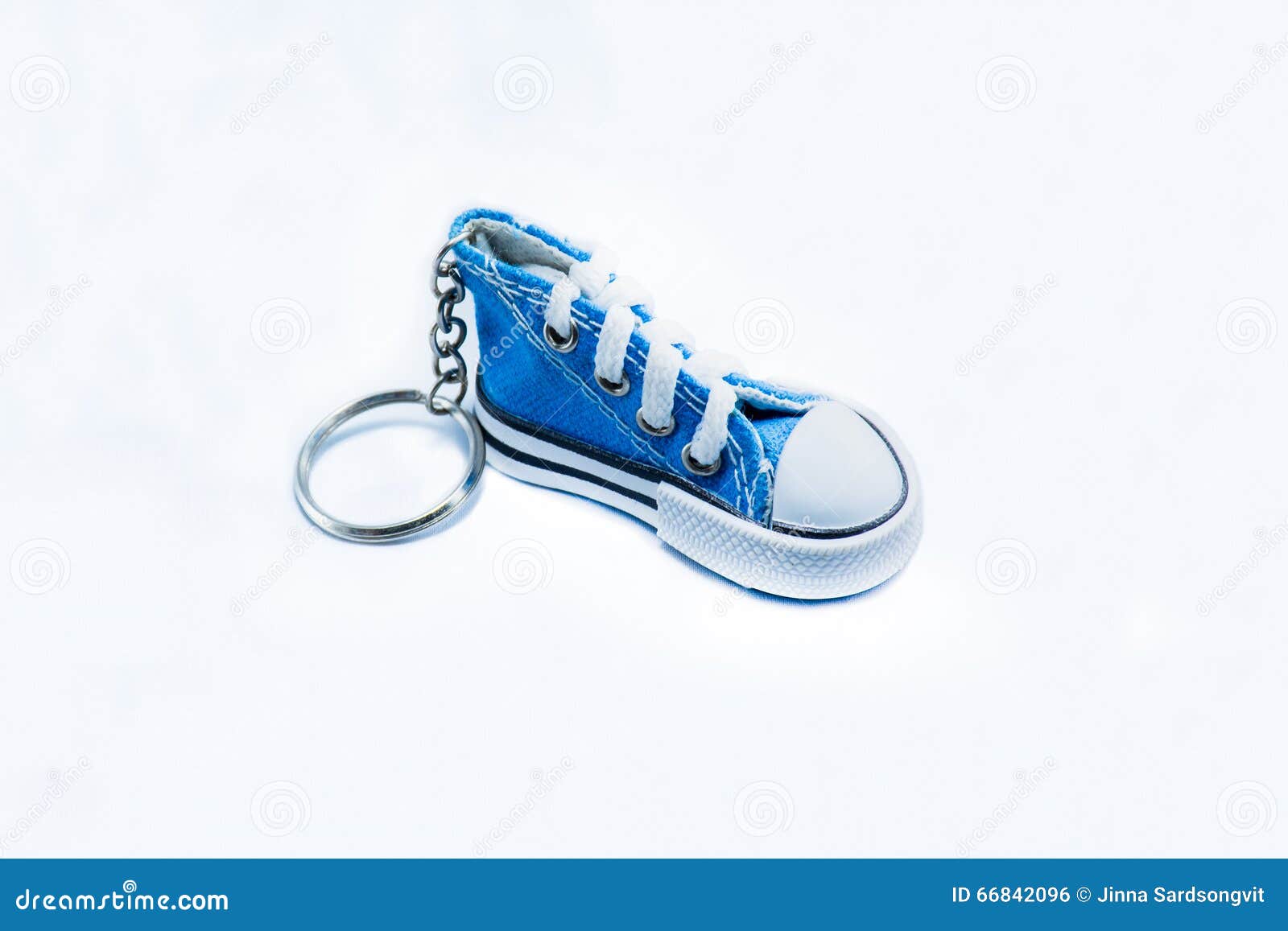 blue sneeaker key chain  on white background