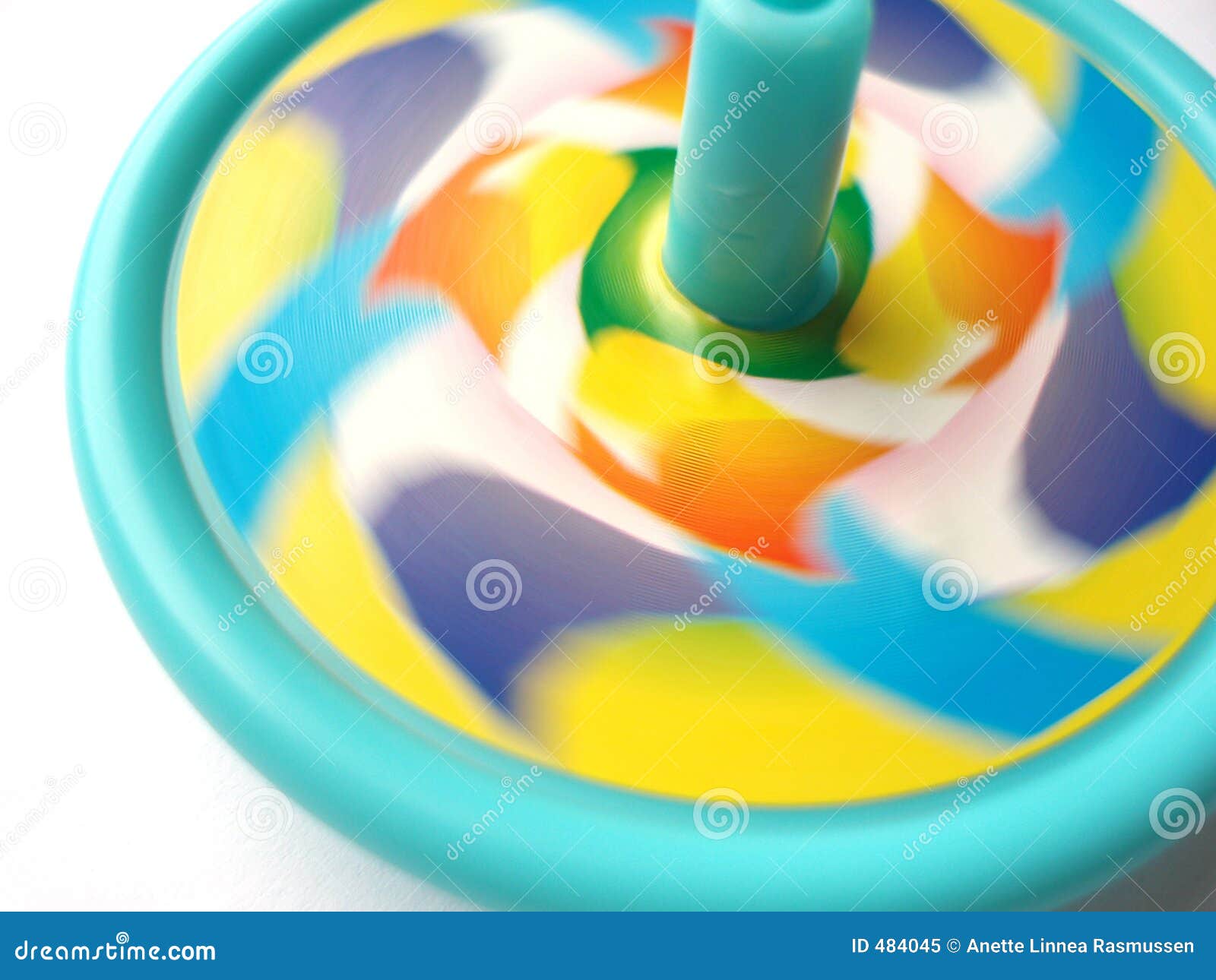 Blue spinning top stock image. Image of game, shape, movement 484045