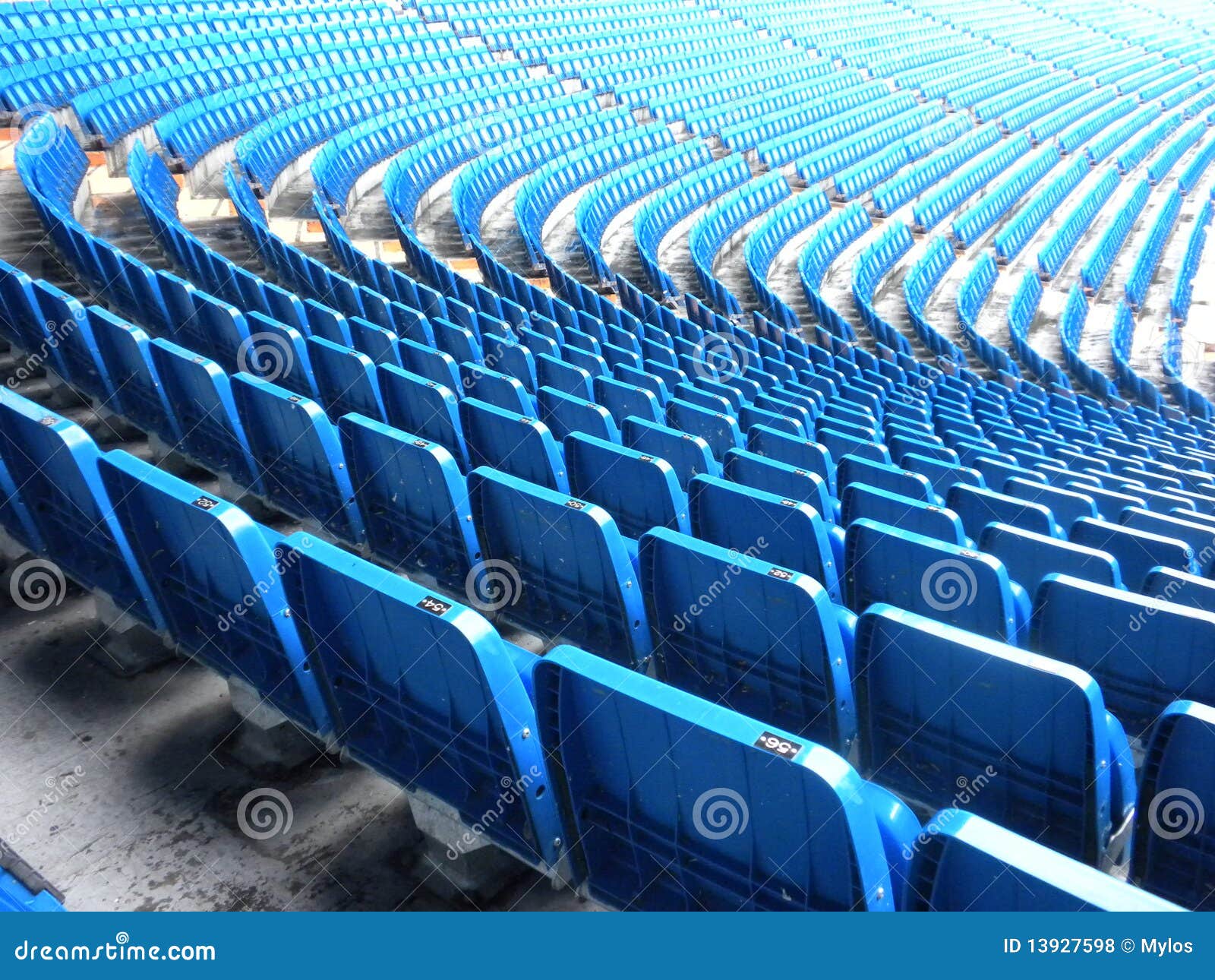 Blue stadium seats stock photo. Image of fugue, plastic 13927598