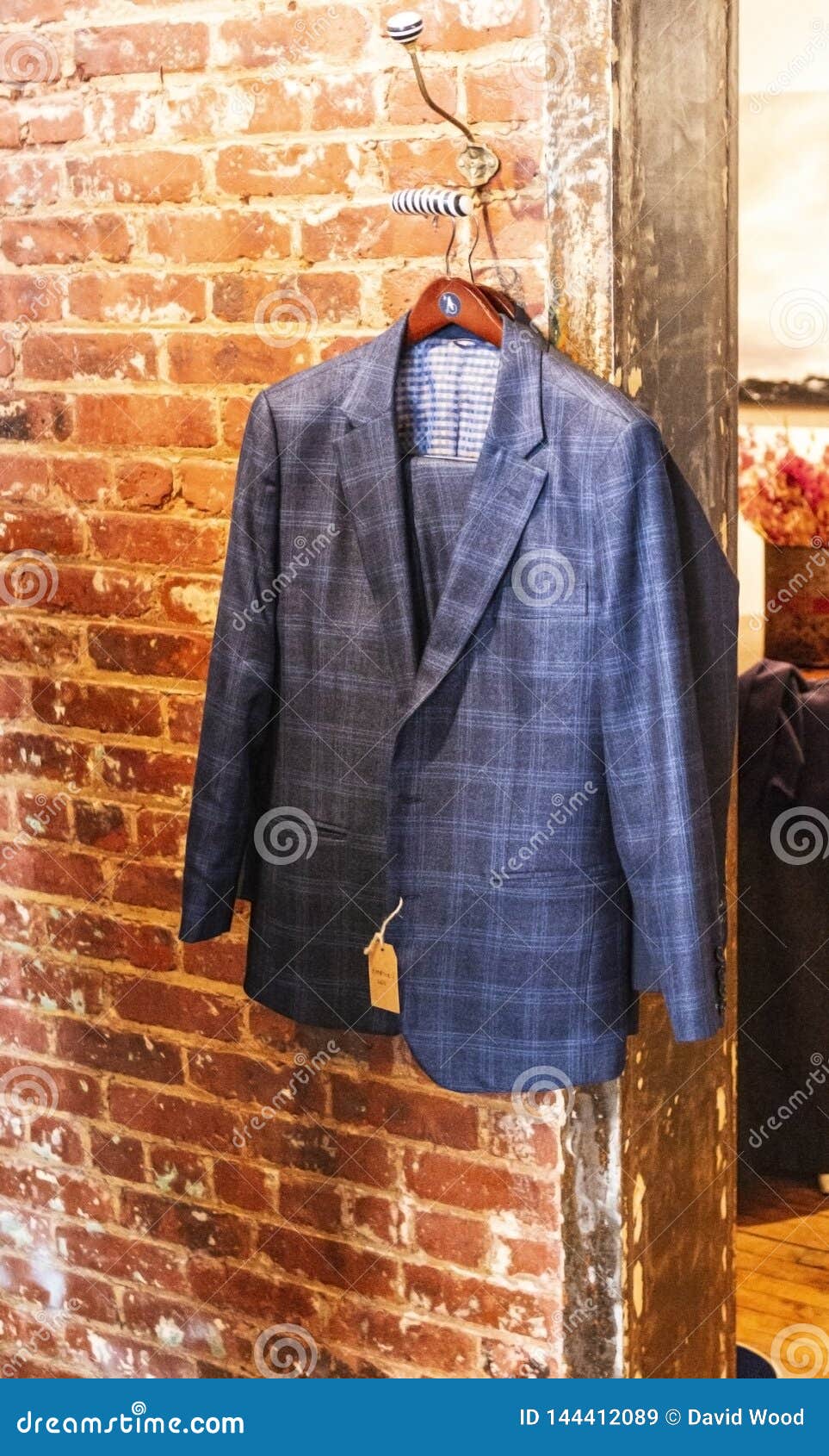 Blue Suit Hanging on a Brick Wall Stock Image - Image of color, tuxedo ...