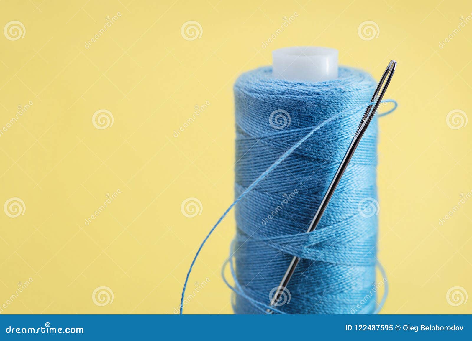 Blue Thread Reel with Large Needle for Sewing. Stock Image Image of material, needle 122487595