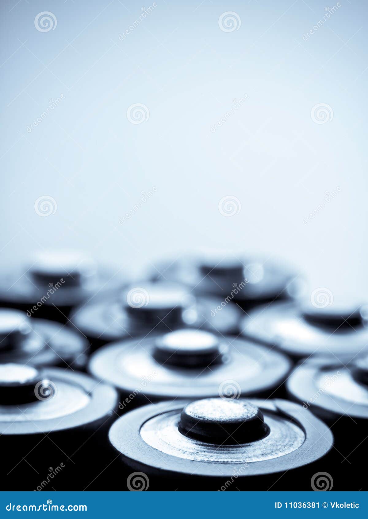 Blue toned batteries stock image. Image of close, poles 11036381