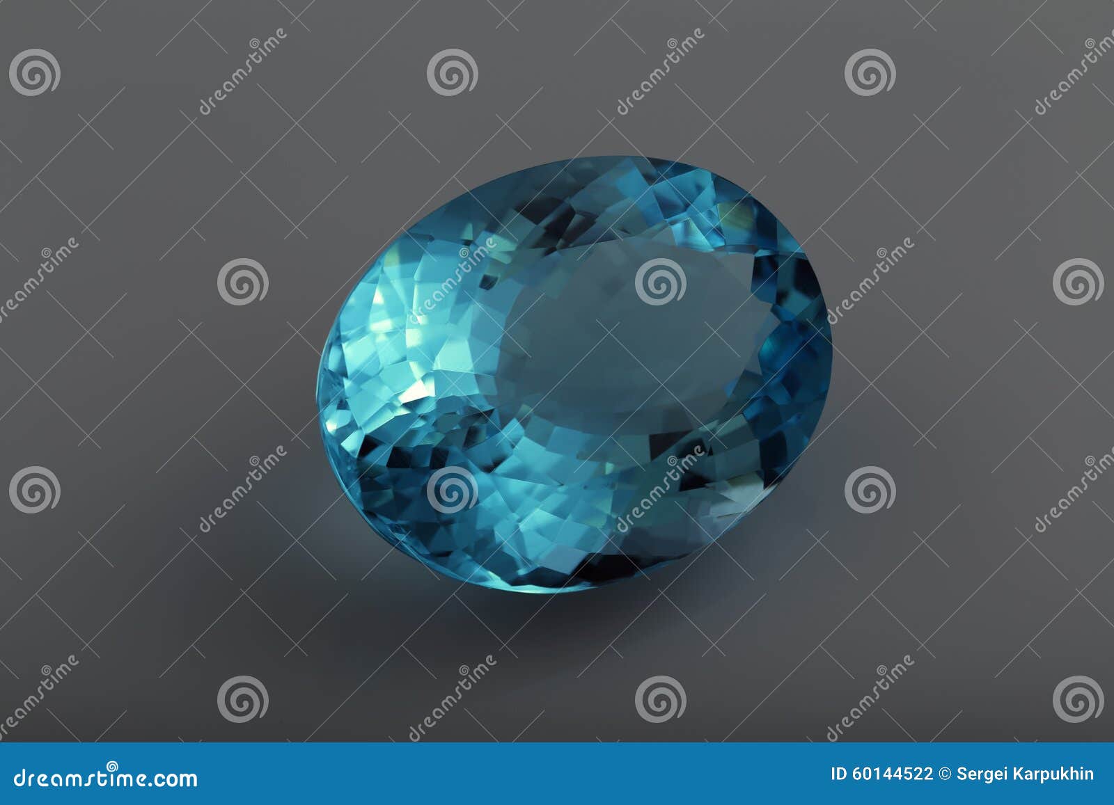 Blue topaz stock photo. Image of jewelry, oval, light 60144522