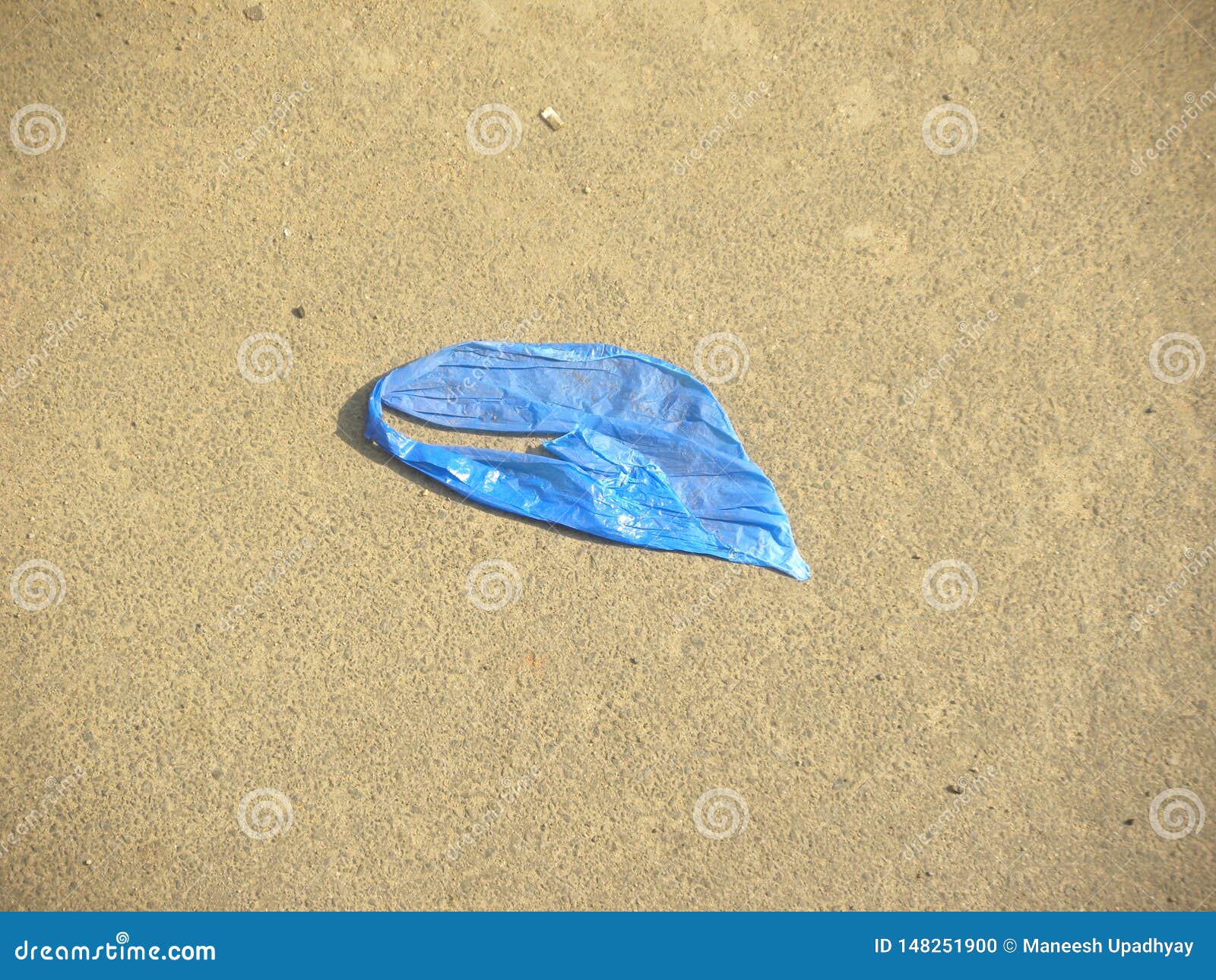 Blue Torn Thrown Plastic Bag Stock Photo Image of floor
