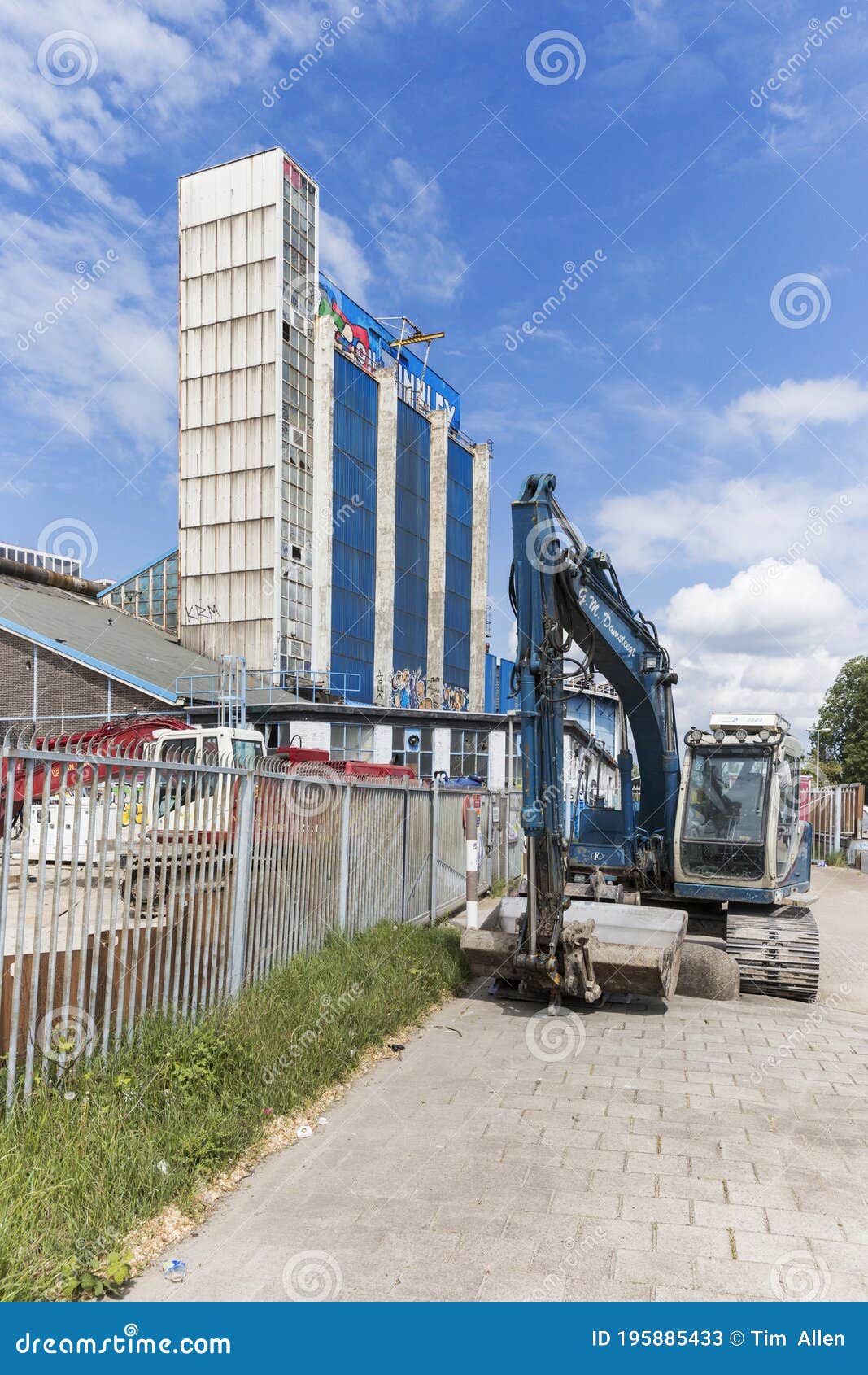 Blue Tractor and Industrial Warehouse Editorial Stock Photo Image of