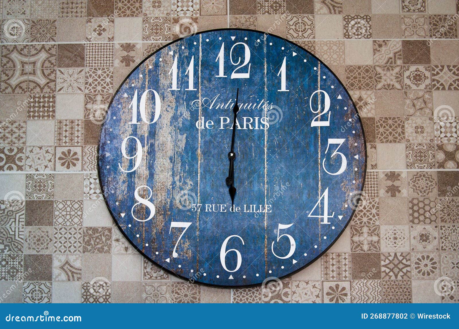 Blue Vintage Clock with White Numbers Hanged on Wall Editorial