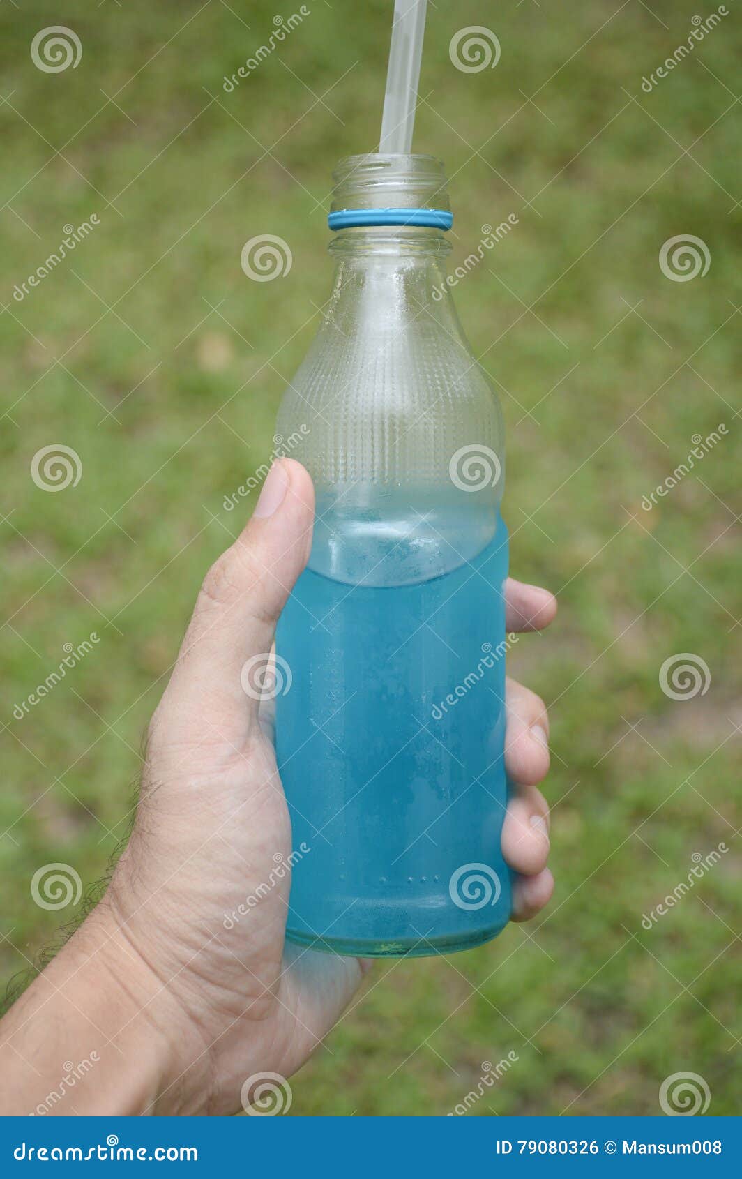 Blue Water Drink on Man Hand Stock Photo Image of aqua, healthy 79080326