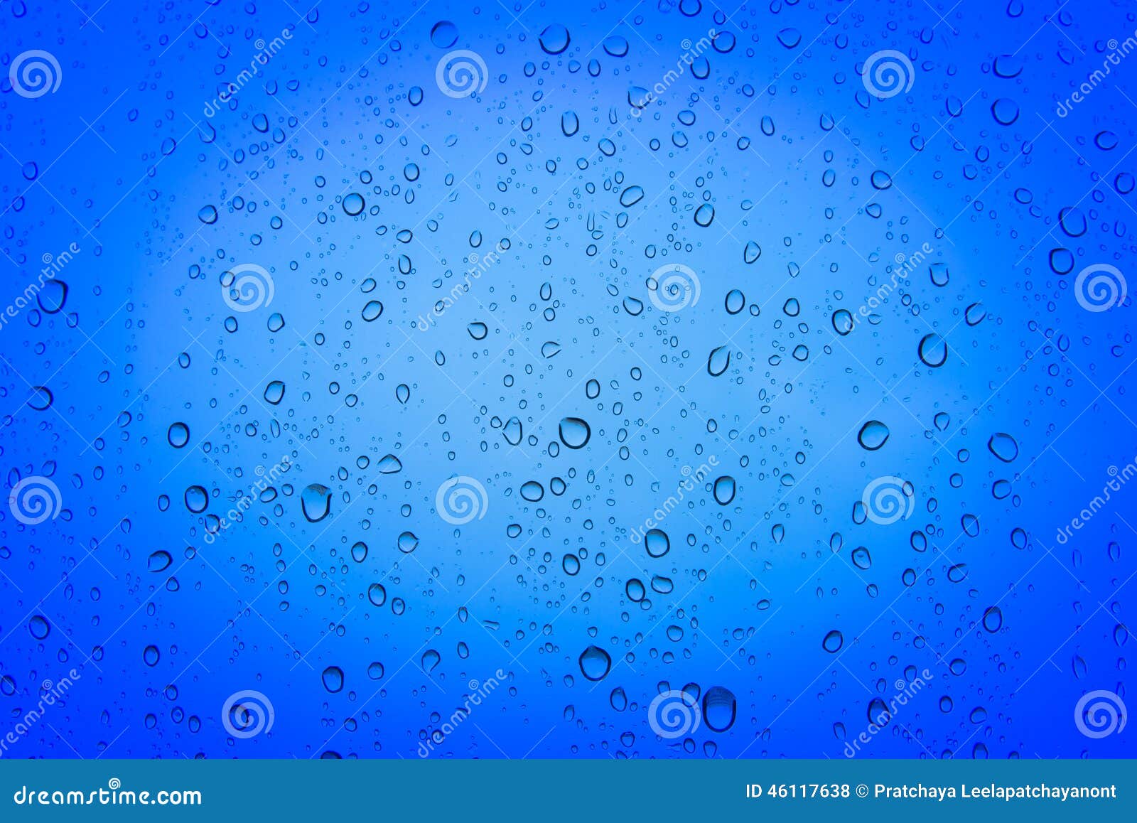 Blue water drops on the mirror, background