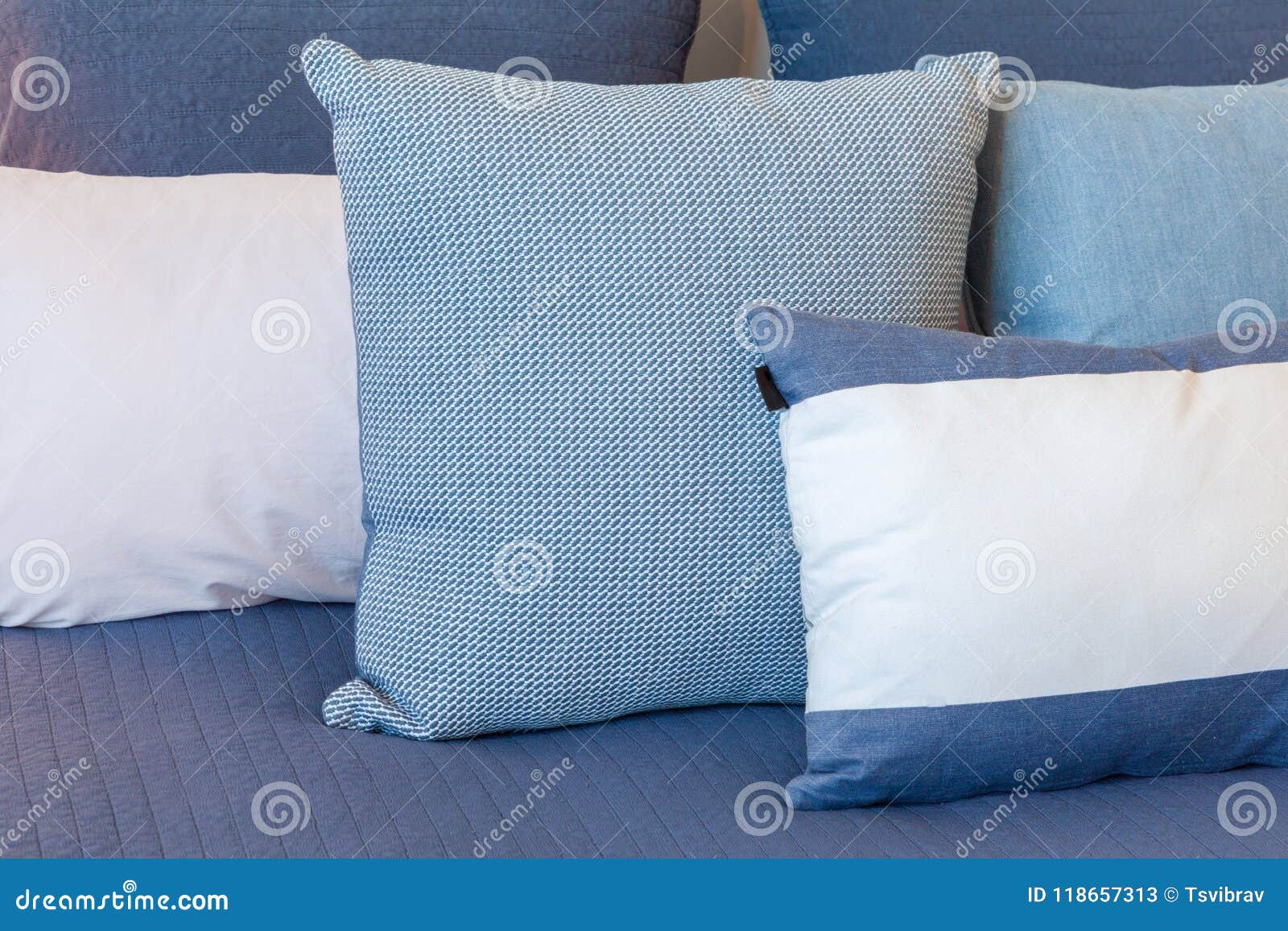 Blue and White Pillows on a Bed. Stock Image Image of closeup, cozy 118657313