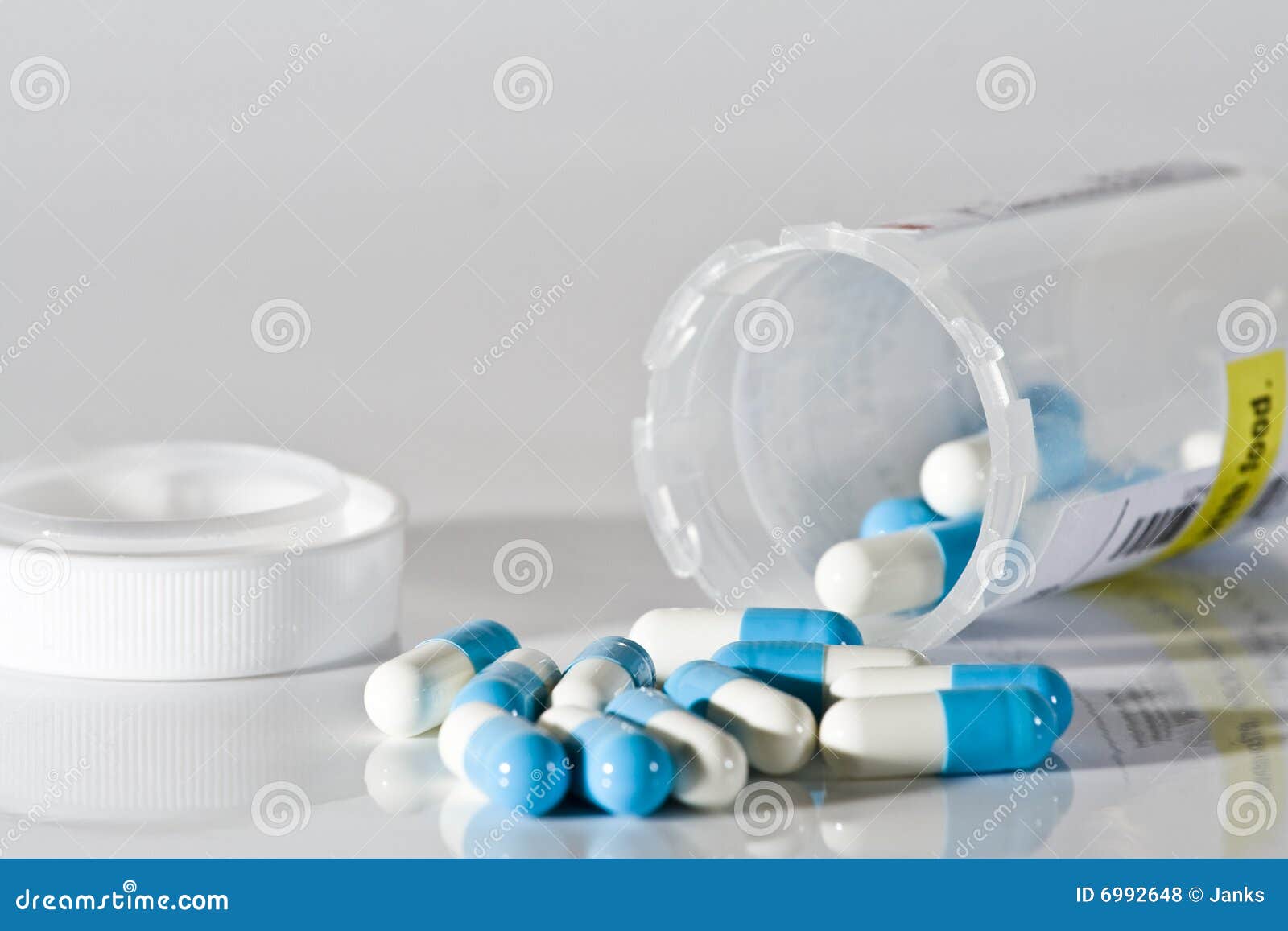 Blue and white pills stock photo. Image of addiction, herbal 6992648