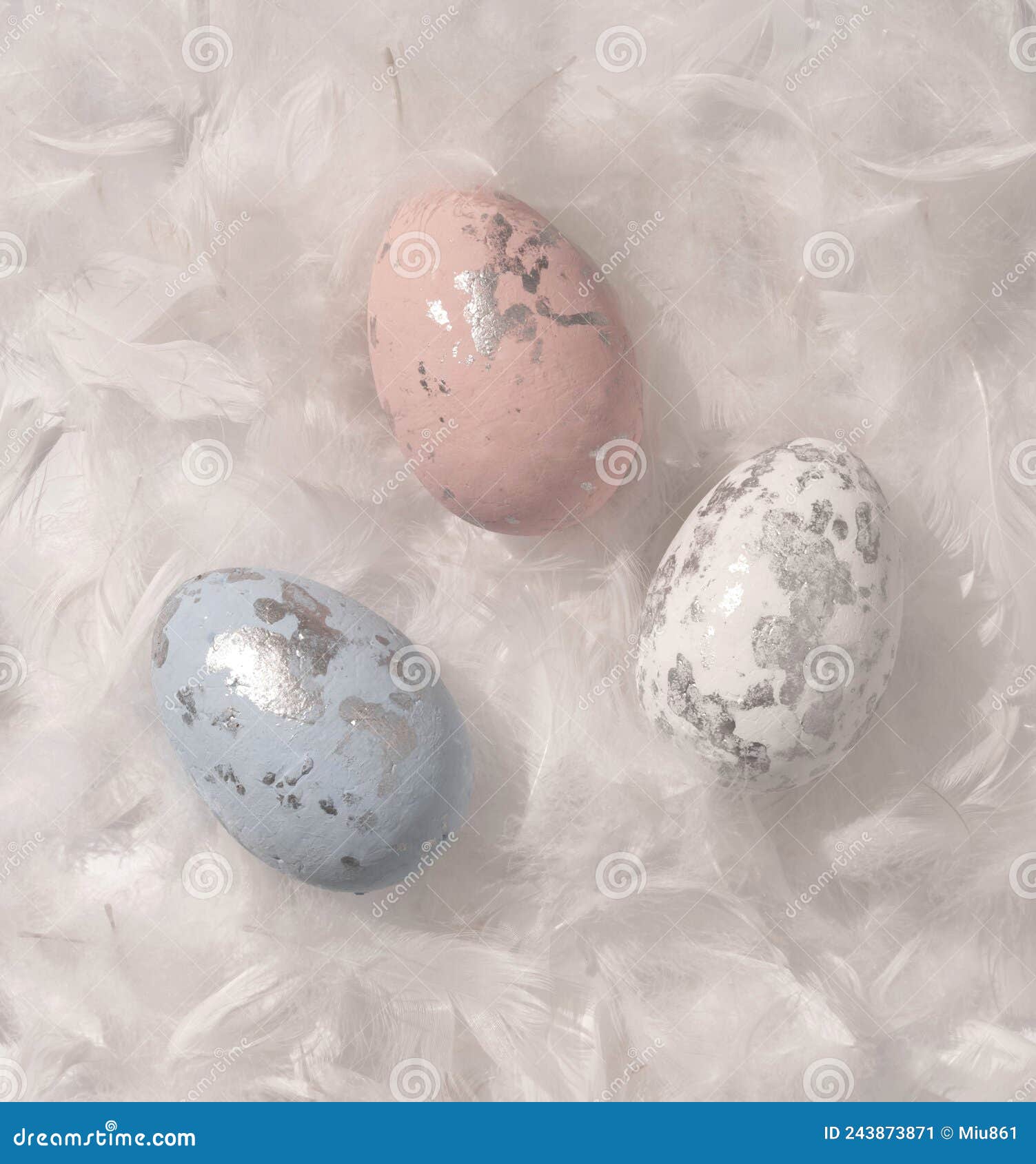 Blue, White and Pink Eggs with Black Spots Lying in a White Feathers. Stock Image Image of