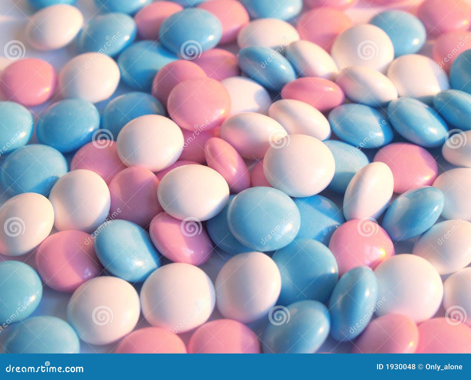 Blue, white and pink pills stock photo 