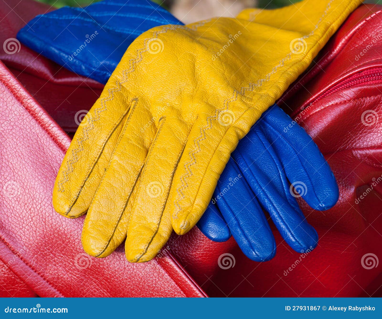 The blue and yellow gloves stock image. Image of leather 27931867