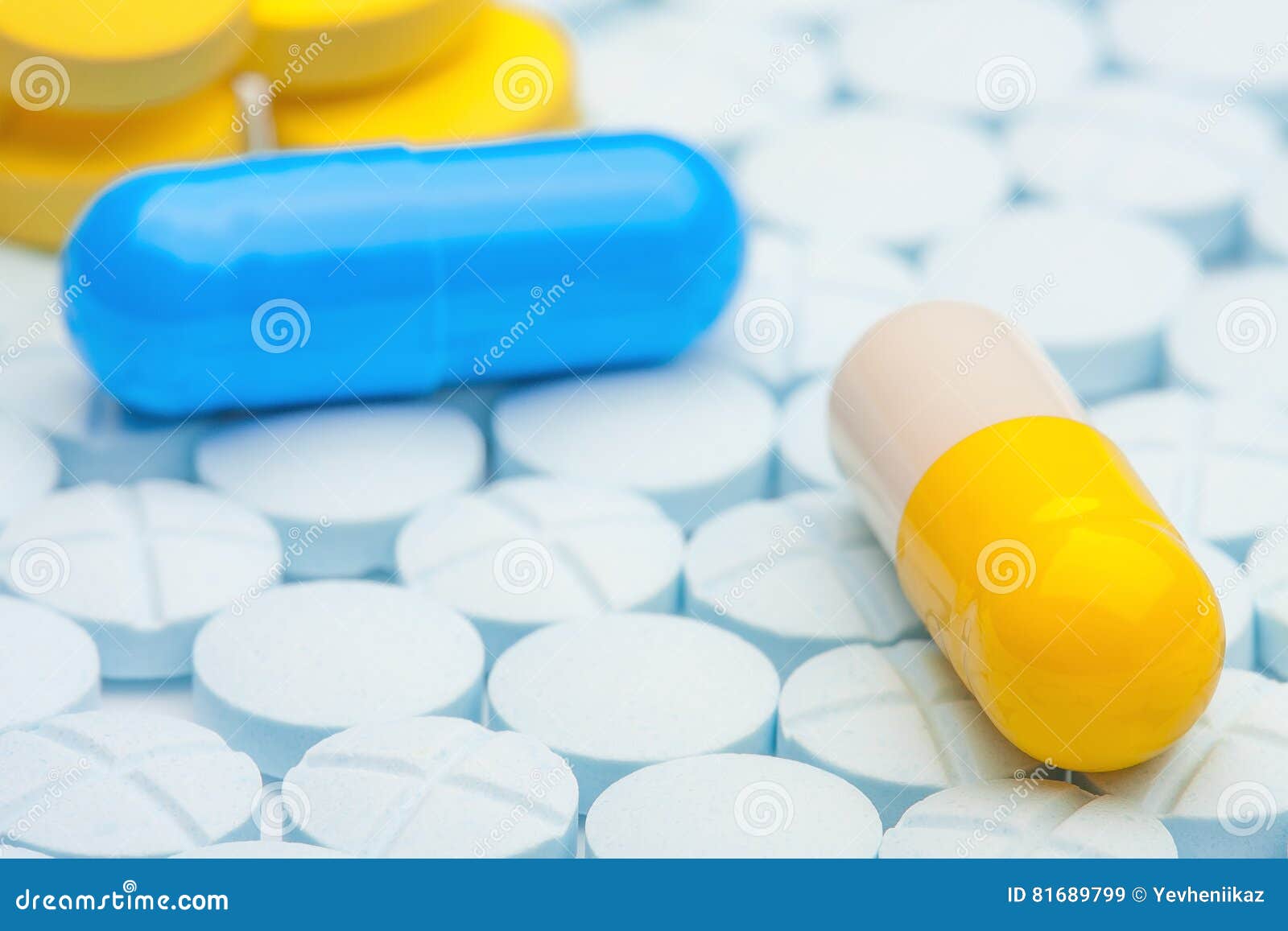 Blue And Yellow Pill On Blue Medical Tablets Stock Image Image of herbal, depressant 81689799