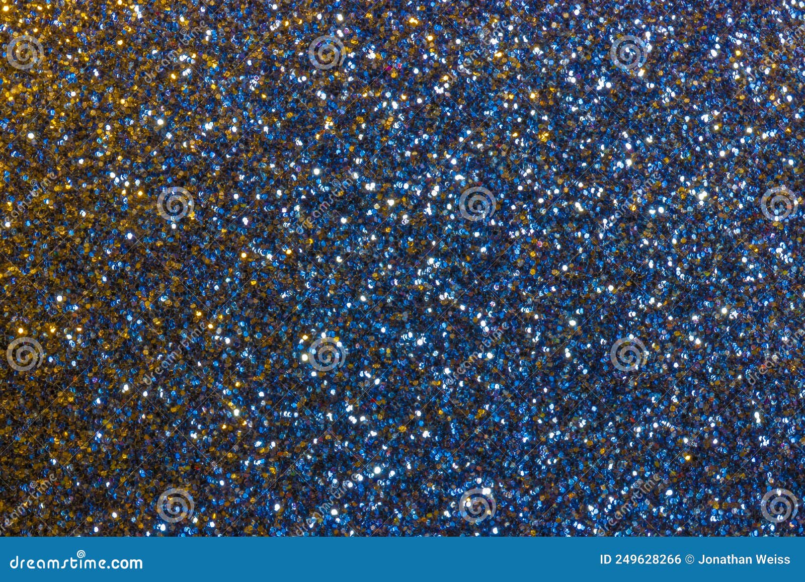 Blue and Yellow Sparkle Abstract Background. Macro Sparkle Creates Mysterious Glitter Background