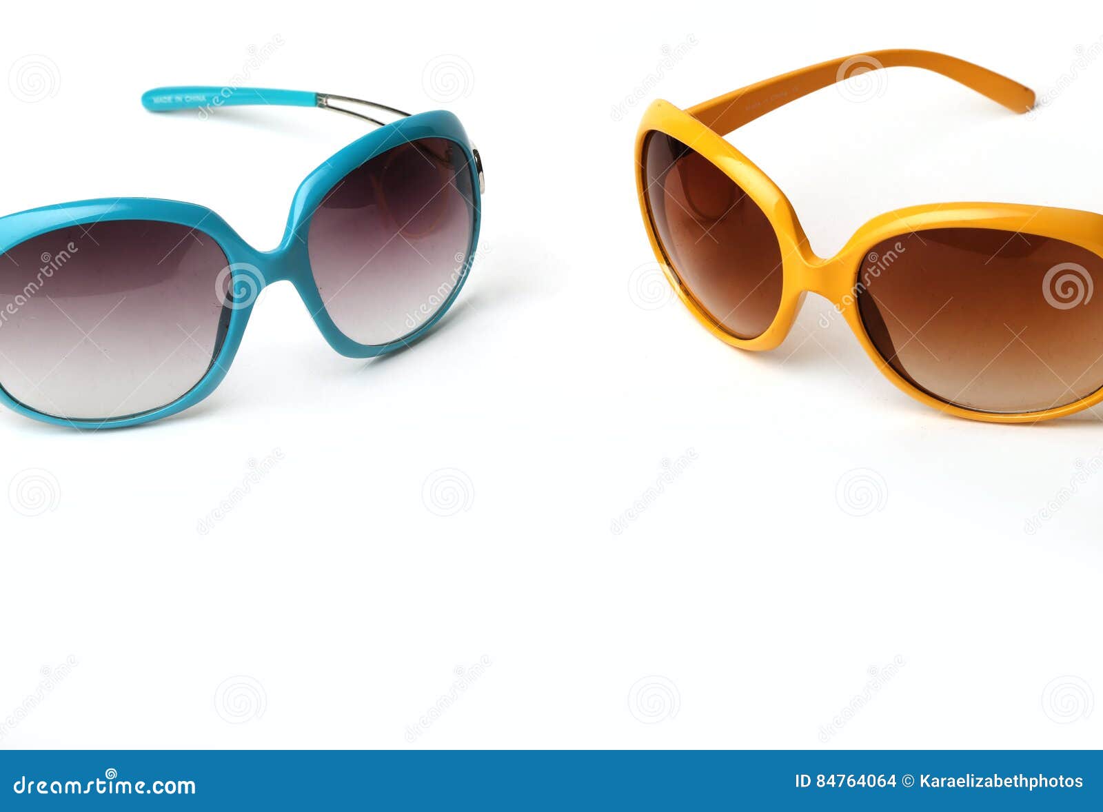 Blue and Yellow Sunglasses on a White Background Stock Photo Image of