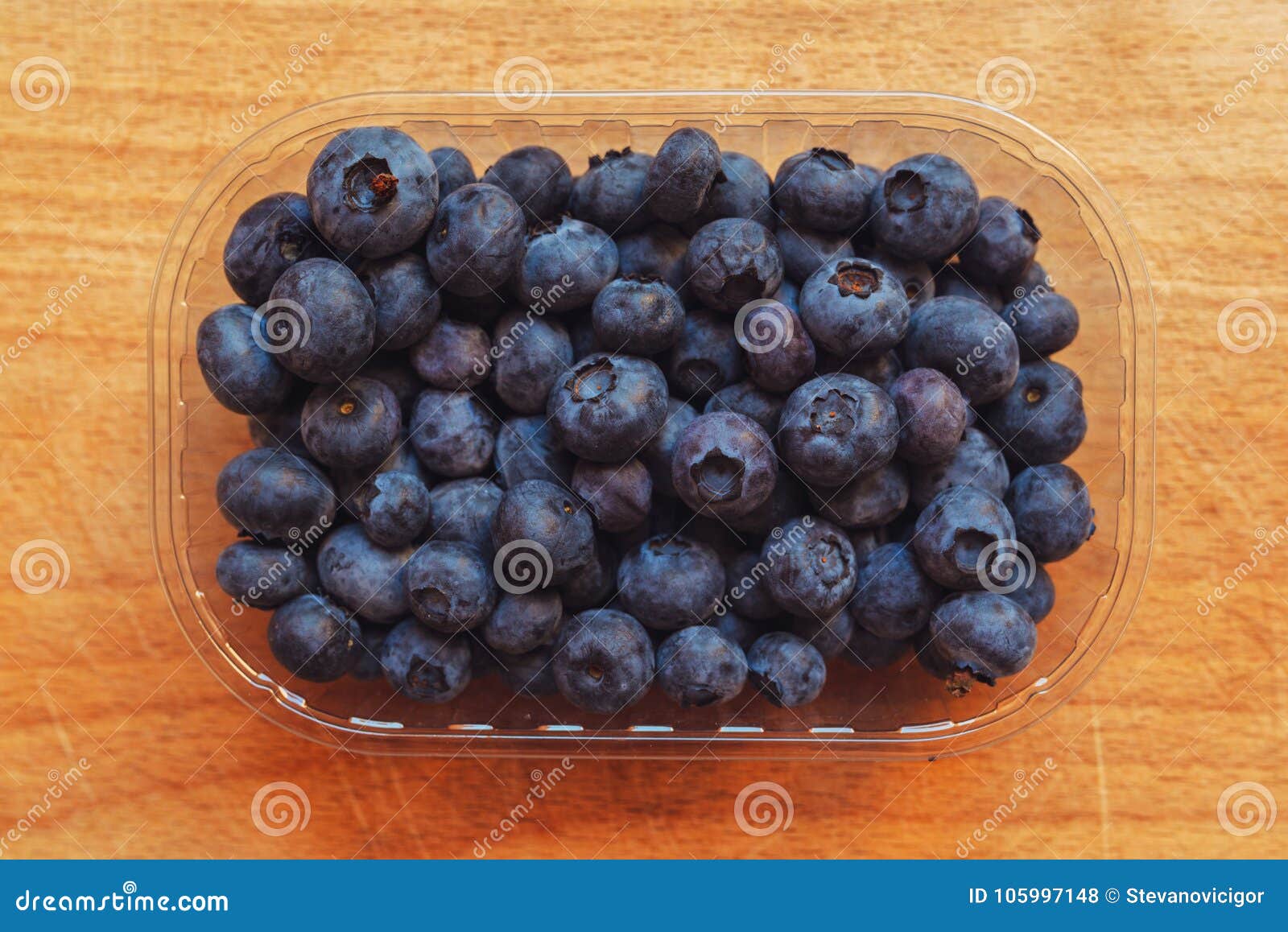 blueberries myrtilles in plastic container box