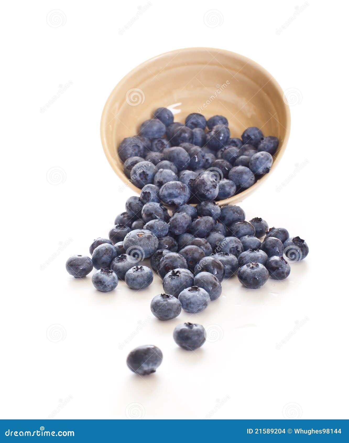 Blueberries Spilling Out of a Bowl Stock Photo - Image of blueberries ...