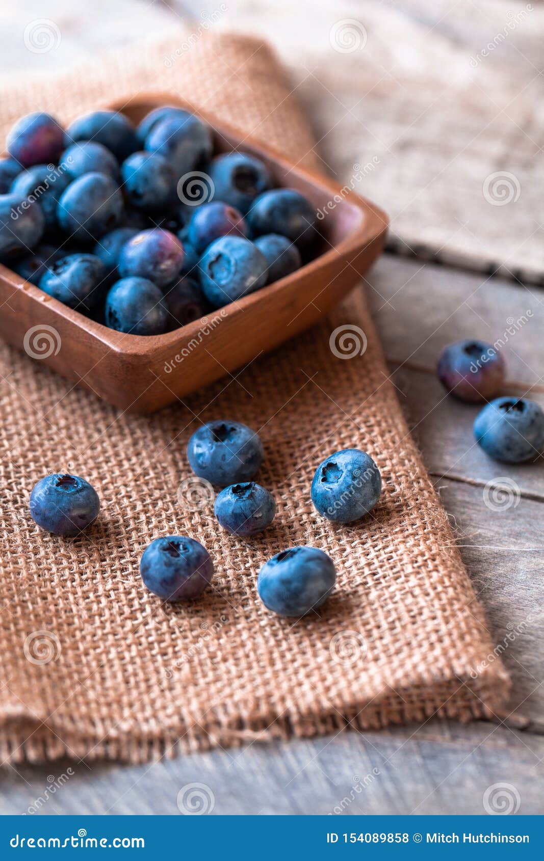 blueberries in a wood bowl