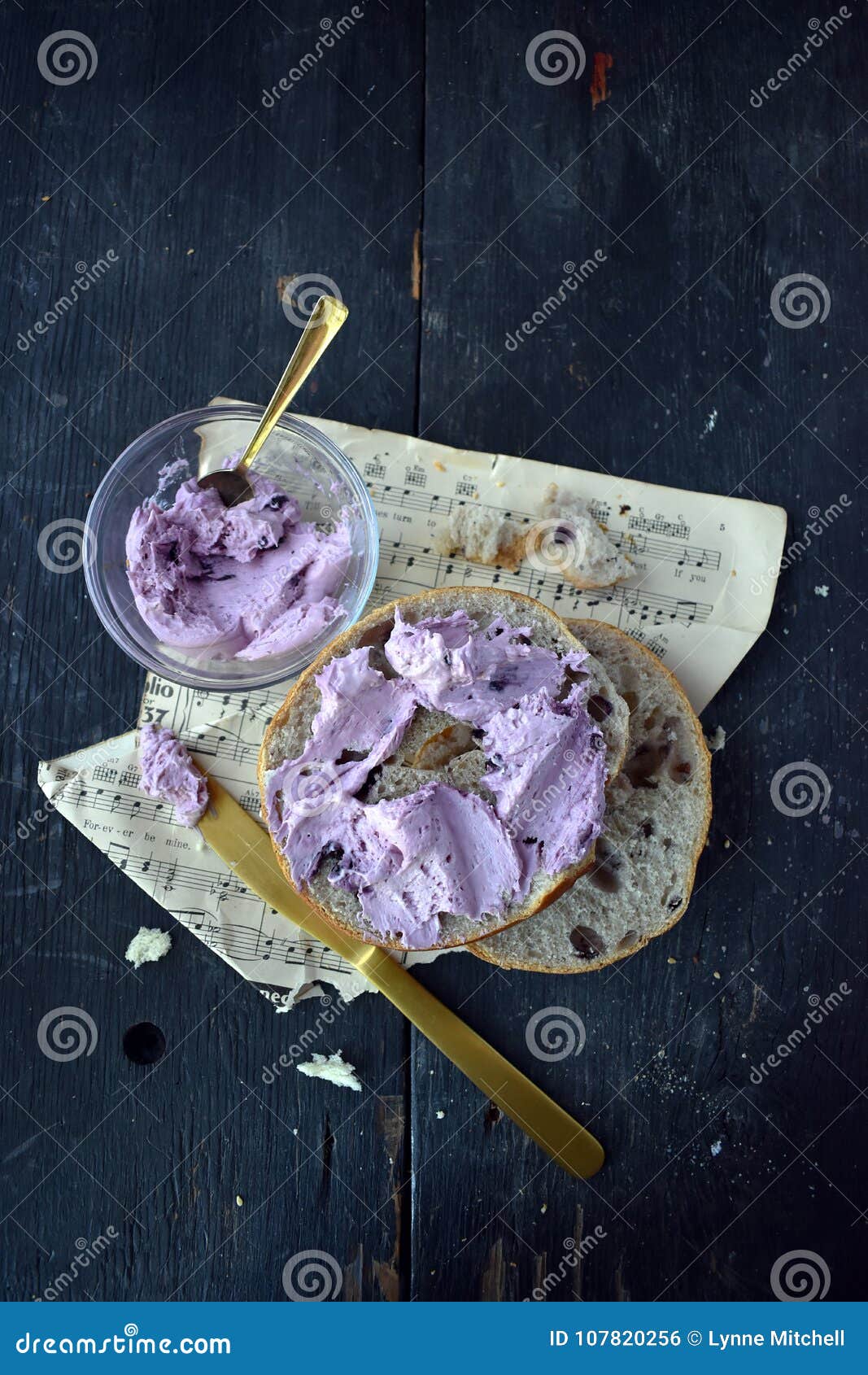 Blueberry Bagels With Blueberry Cream Cheese On Rustic Table With Music Sheets Vertical Layout ...