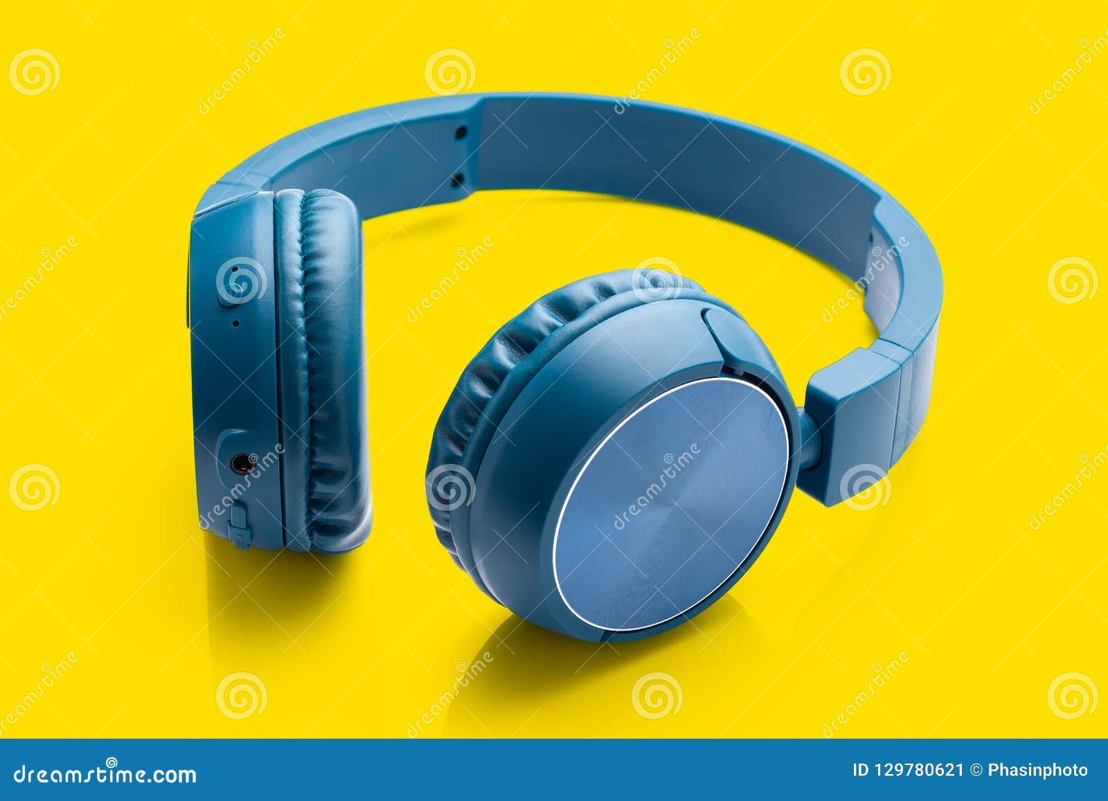 Bluetooth Blue Headphone on Yellow Stock Image Image of education, stereo 129780621