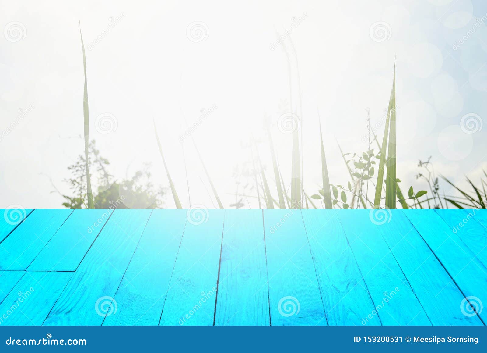 The Blur Cool Blue Sky White Cloud with Old Wooden Table Foreground