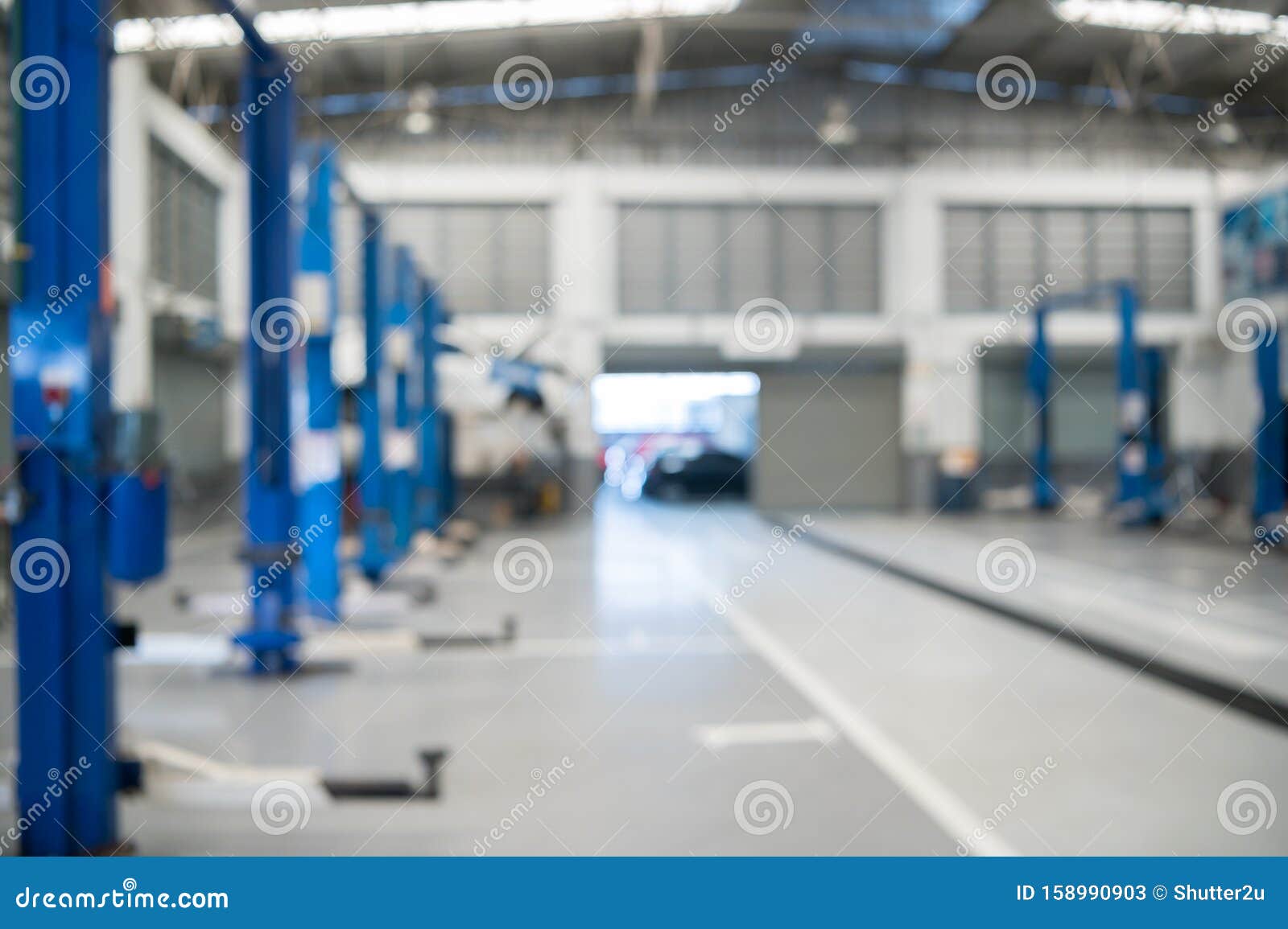 Blurred Background of Repairing Garage with No People. Blurry Mechanics